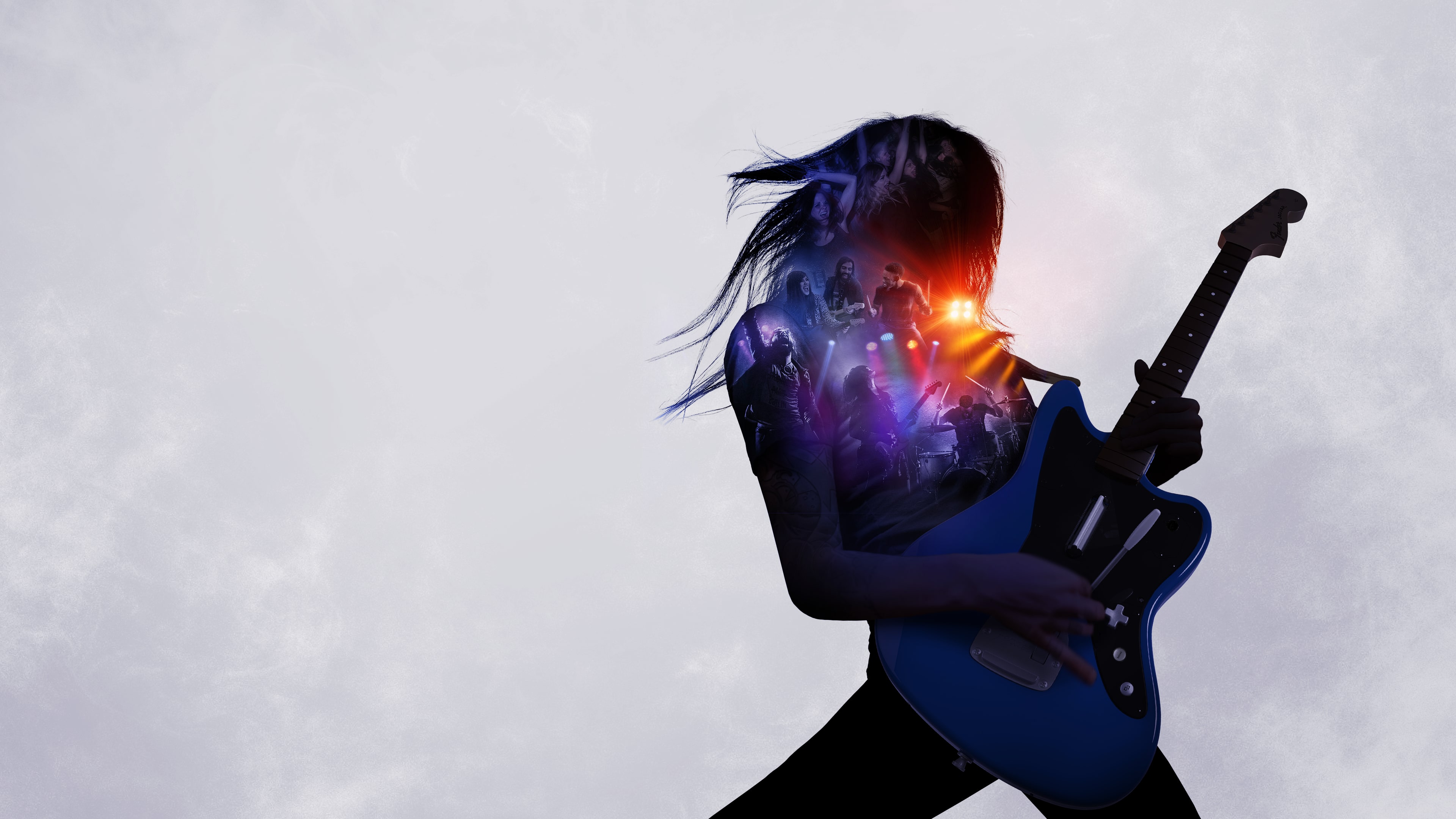 A silhouette of a performer on stage during a live concert with bright, glowing backlights.