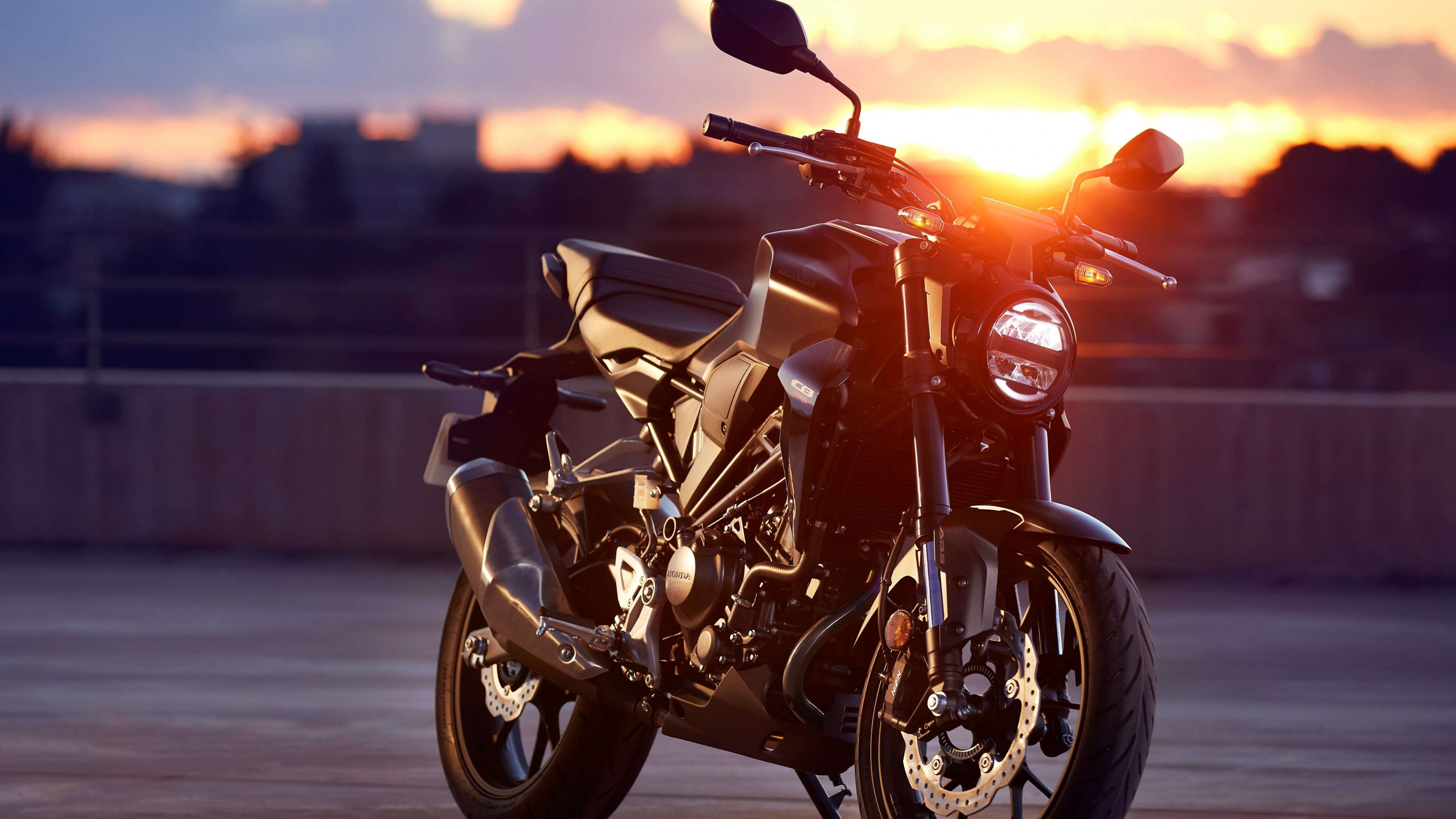 A lineup of high-performance 2022 sports motorcycles with sleek, aerodynamic bodies and vibrant colors.