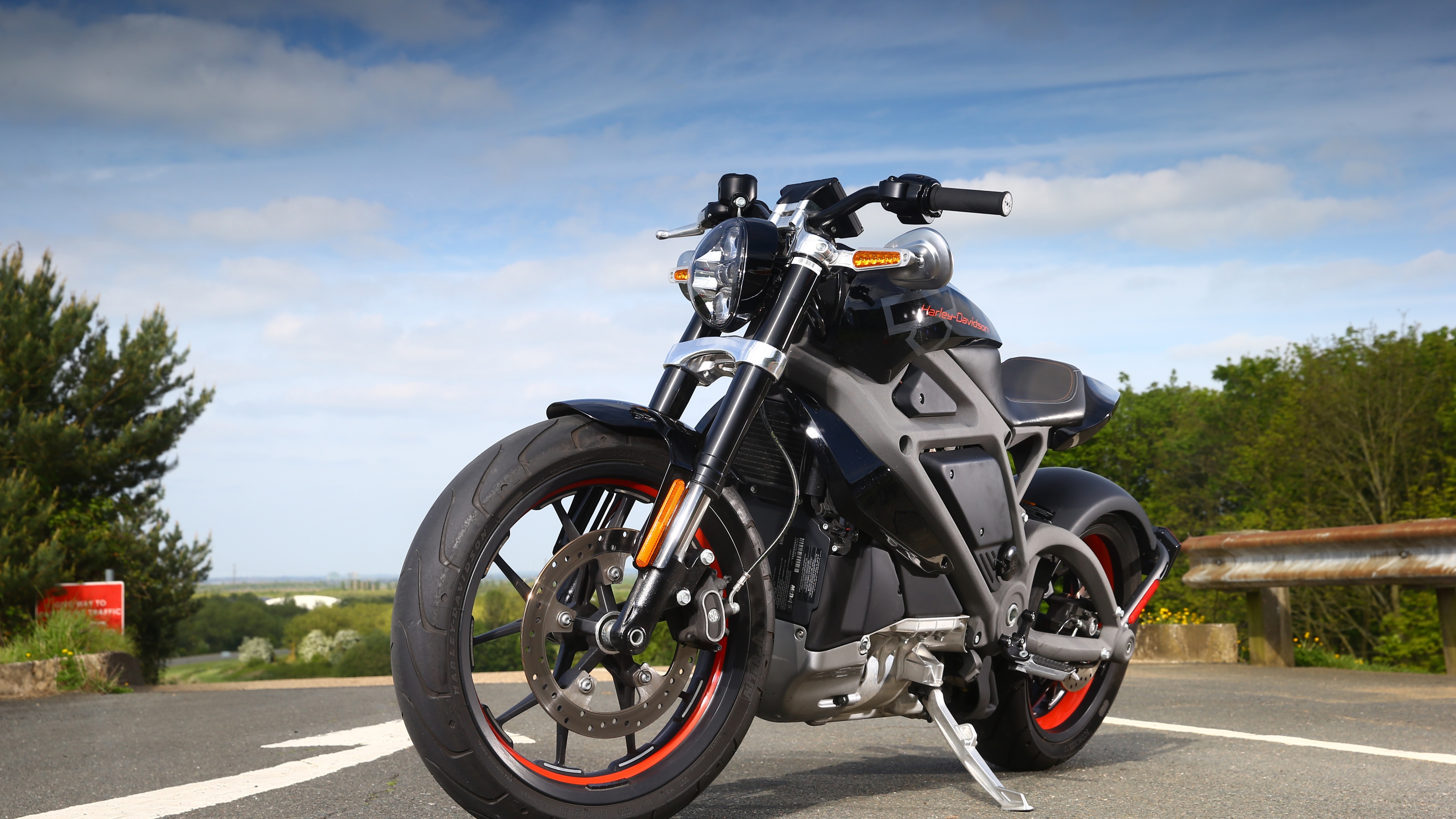 A detailed close-up of a 2022 Harley-Davidson LiveWire electric motorcycle showing its modern design and metallic finish.
