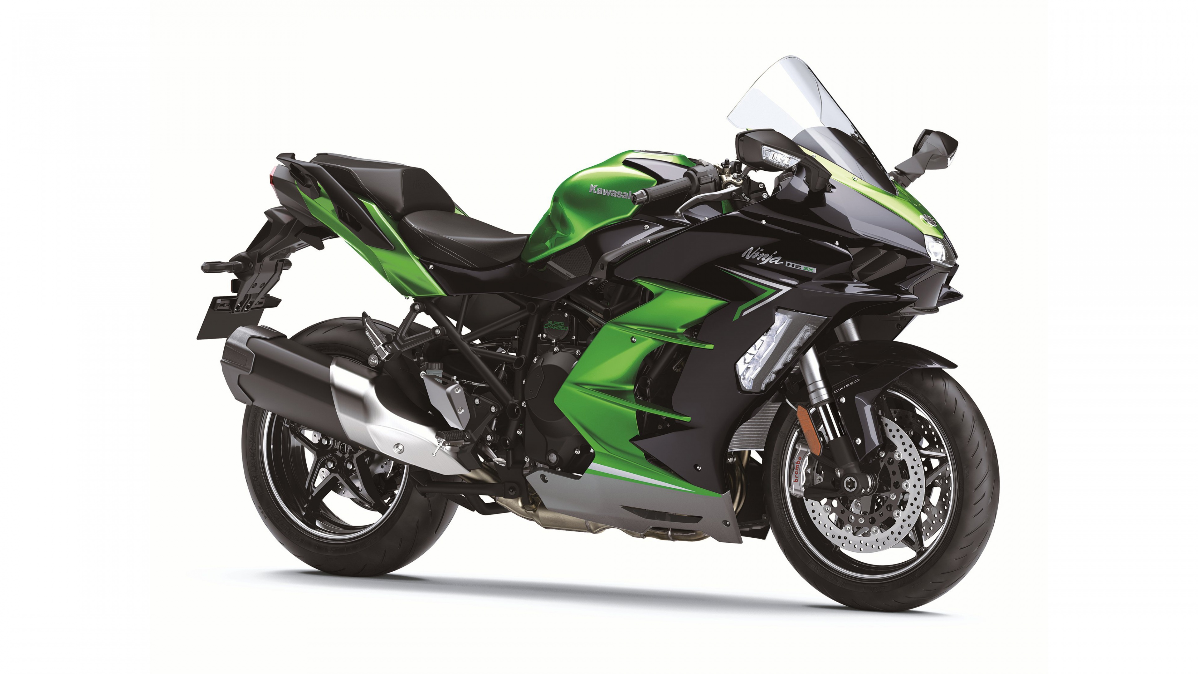 2022 Kawasaki Ninja H2 SX supercharged sports bike isolated on a white background