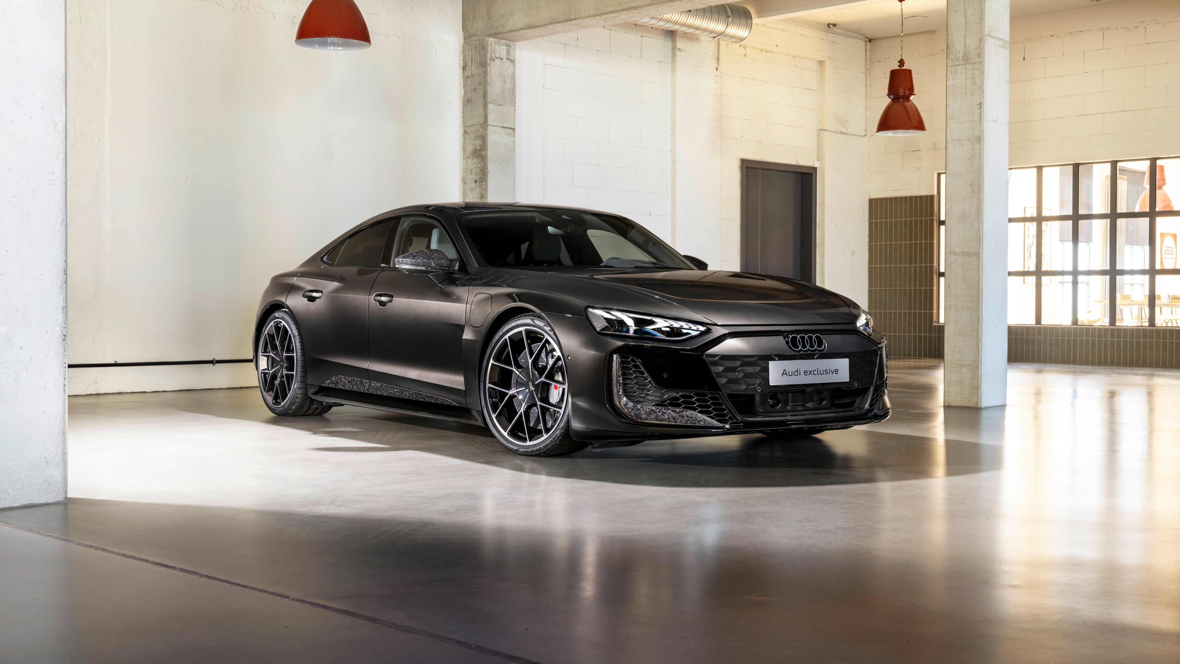 A sleek 2024 Audi RS e-tron GT performance electric luxury sports car.