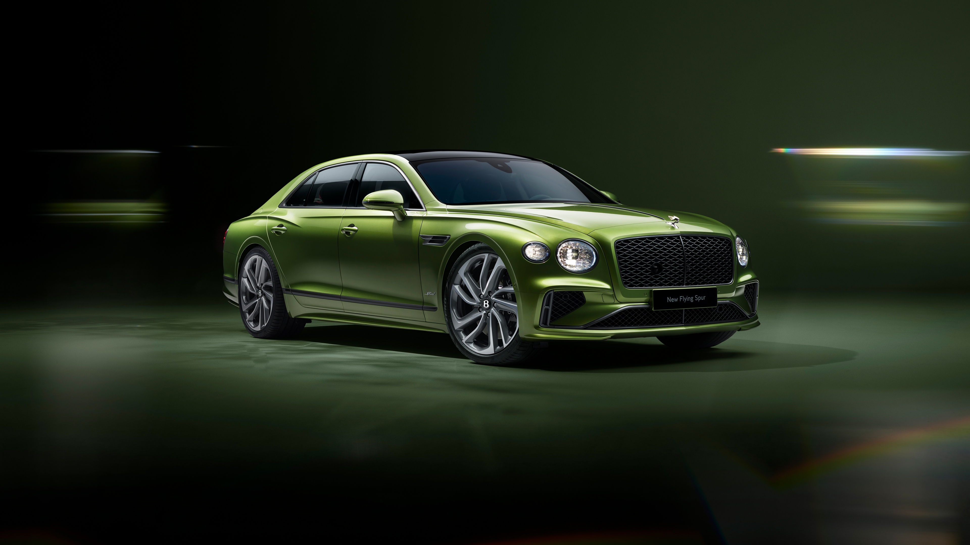 A detailed and professional shot of the 2024 Bentley Flying Spur Speed luxury sedan.