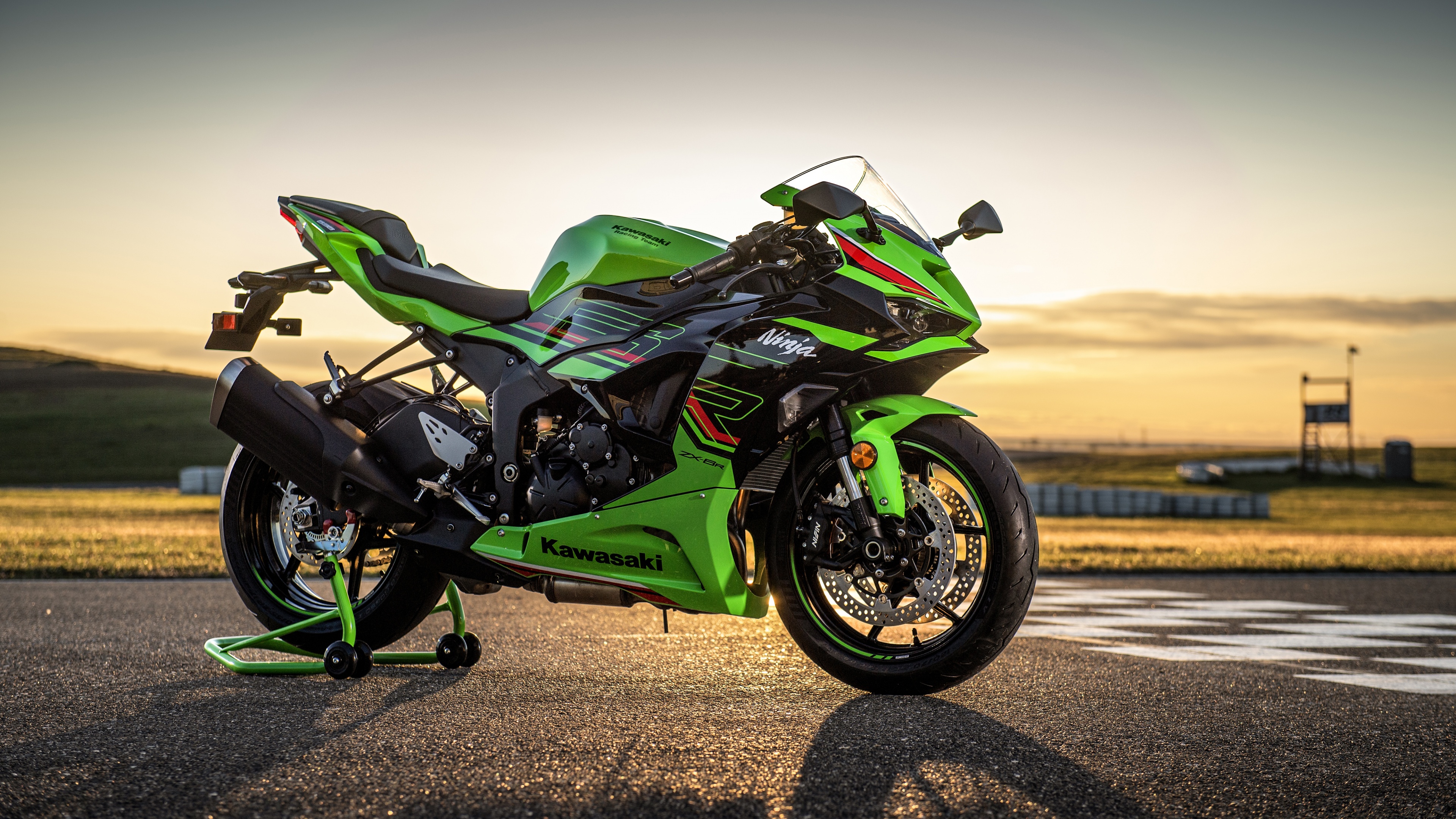 A detailed, high-resolution 5K shot of the 2024 Kawasaki Ninja ZX-6R sports motorcycle in its signature lime green and black livery.
