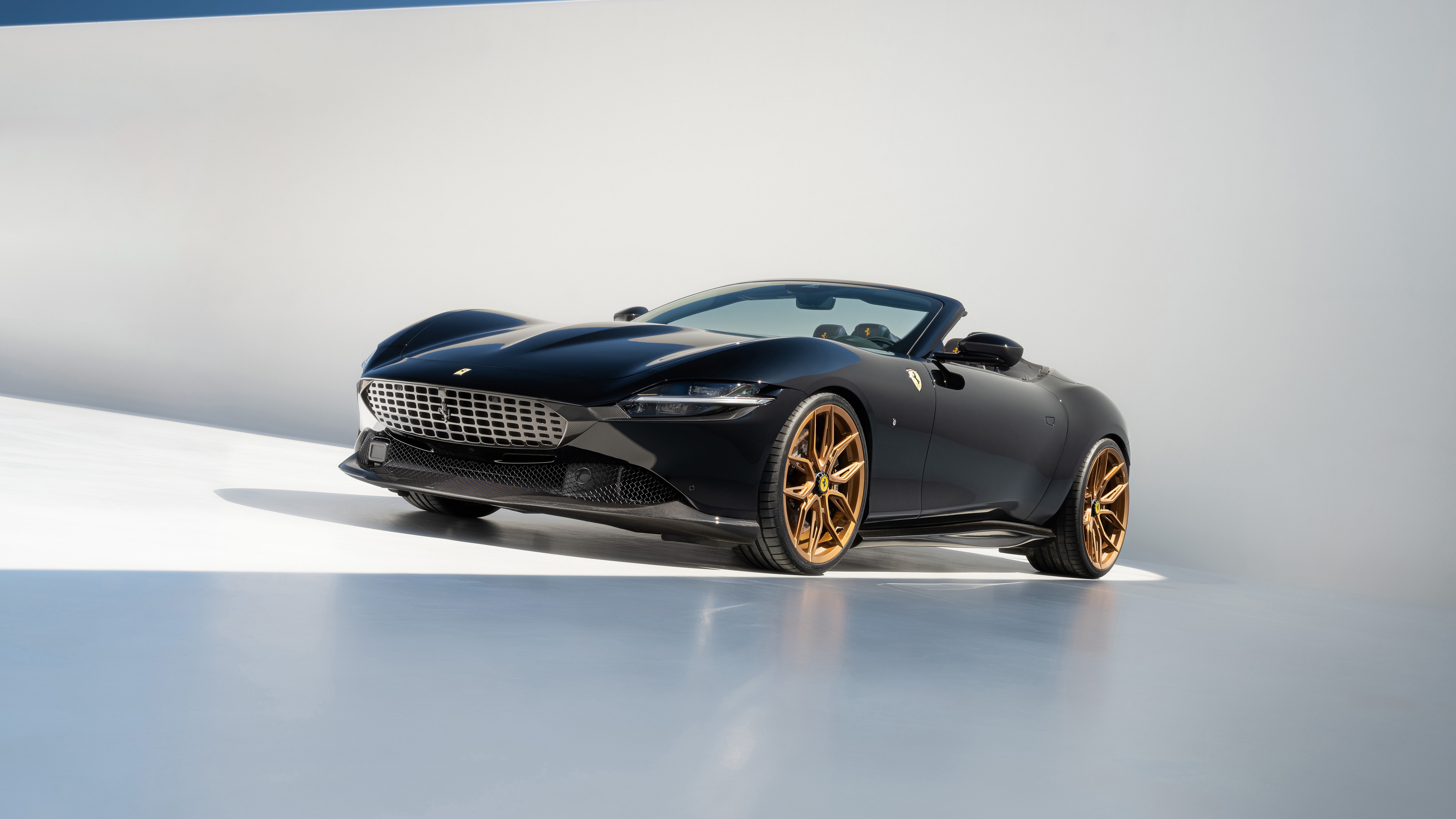 A high-resolution view of a 2024 Ferrari Roma Spider with Novitec tuning, featuring a sleek convertible design and premium finish.