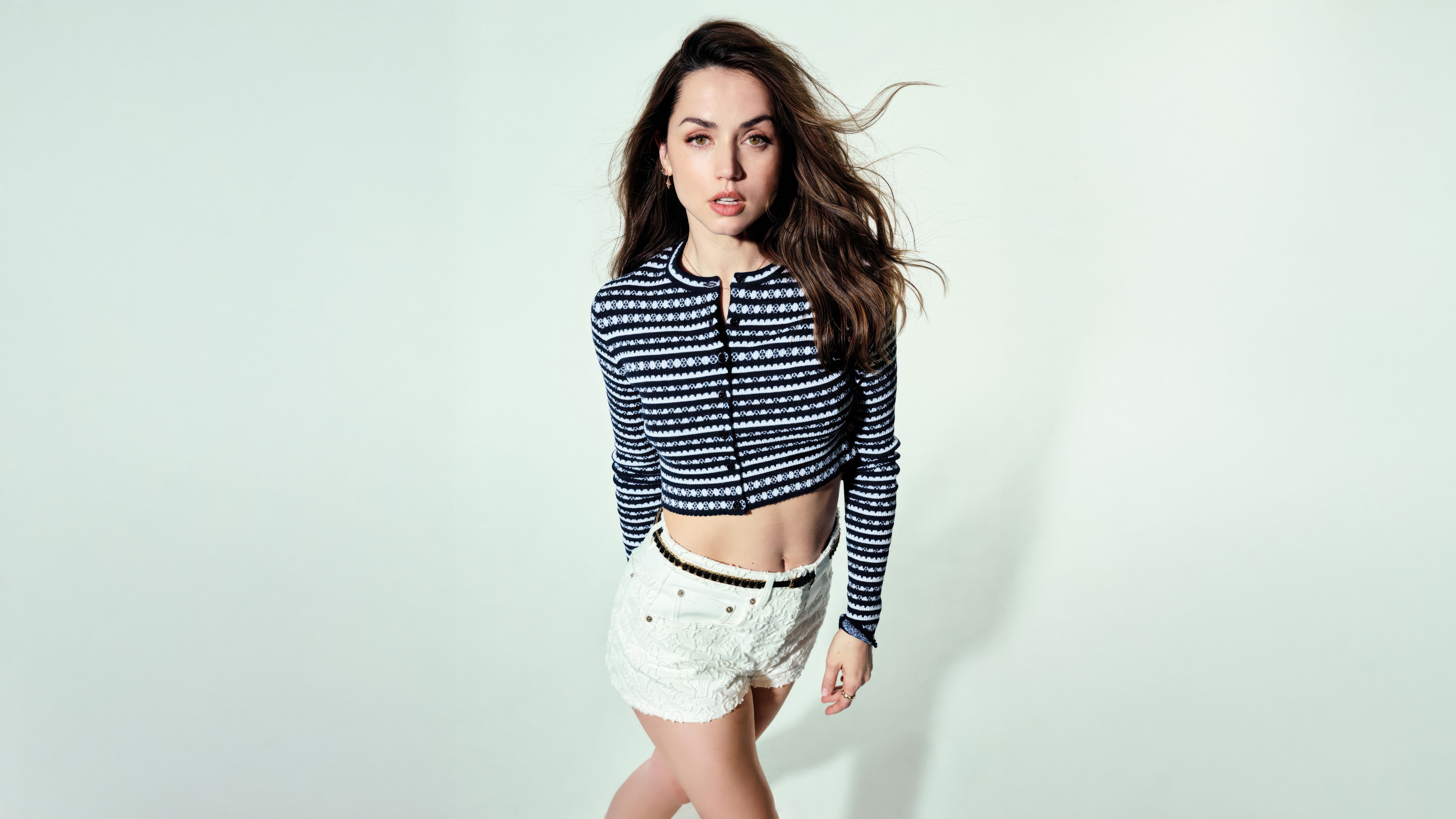 A high-detail professional portrait of actress Ana de Armas for an Elle Magazine photoshoot.