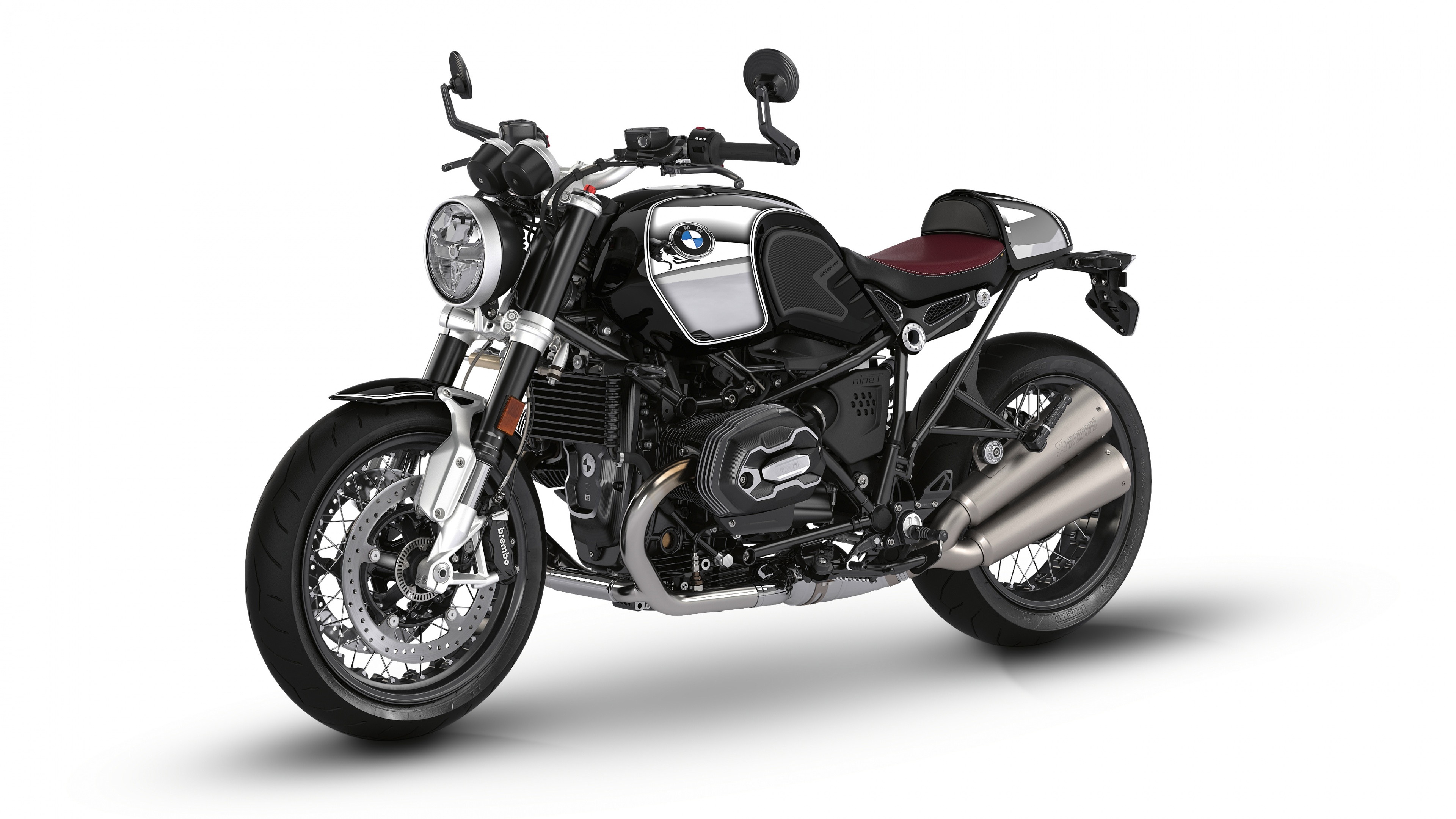 A BMW R nineT cafe racer motorcycle in a modern classic naked bike style on a white background.