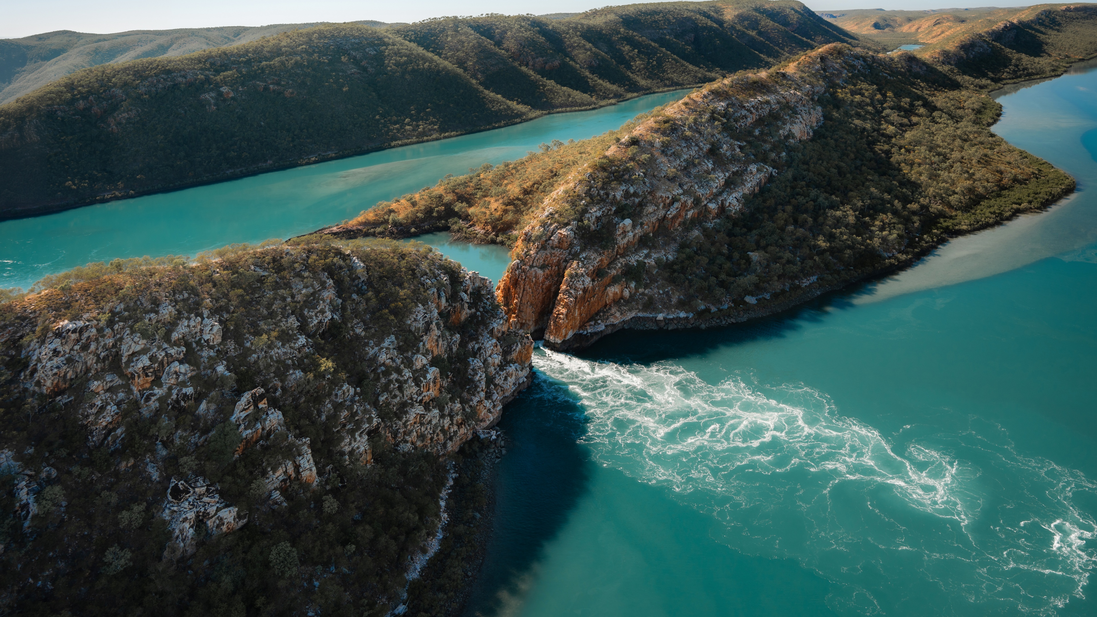 High-resolution 5K aerial shot of an Australian coastal landmark and scenic seascape.