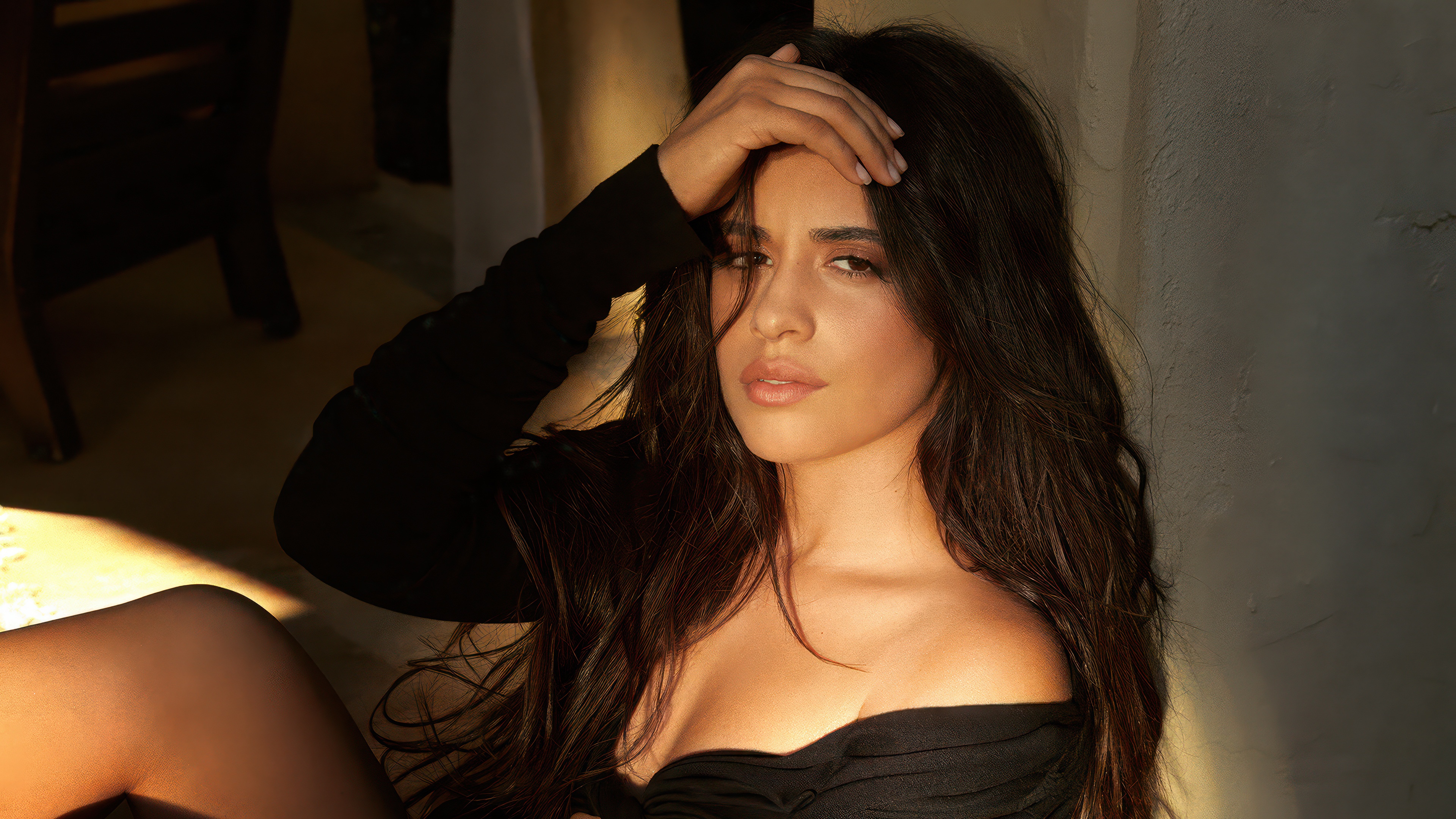 A professional high-fashion portrait of singer Camila Cabello.