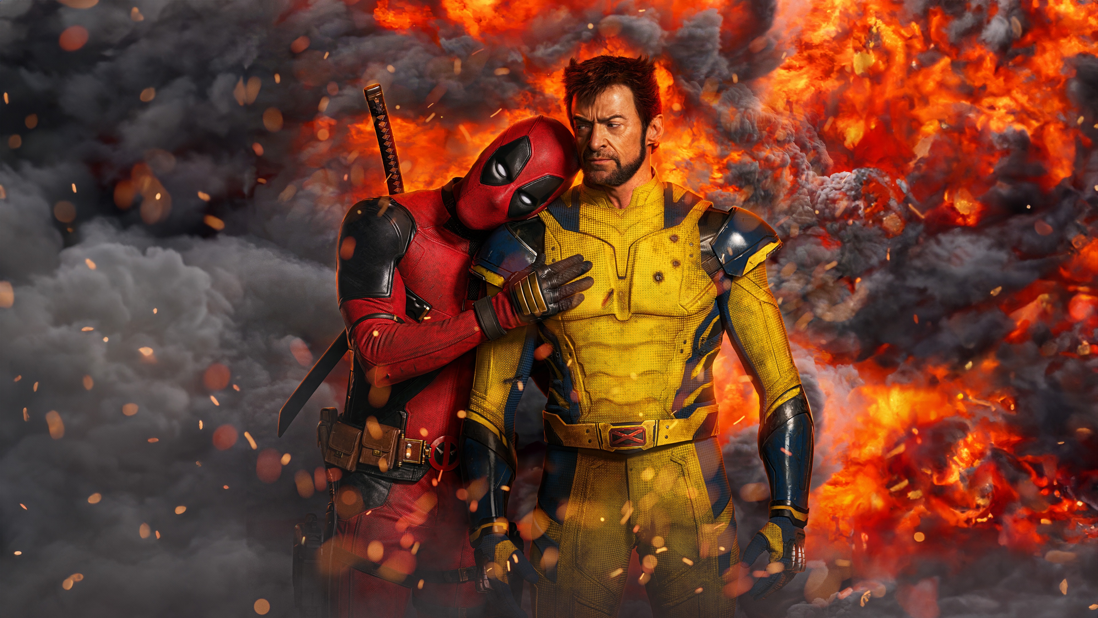 Deadpool and Wolverine standing amidst intense, raging flames and flying sparks.