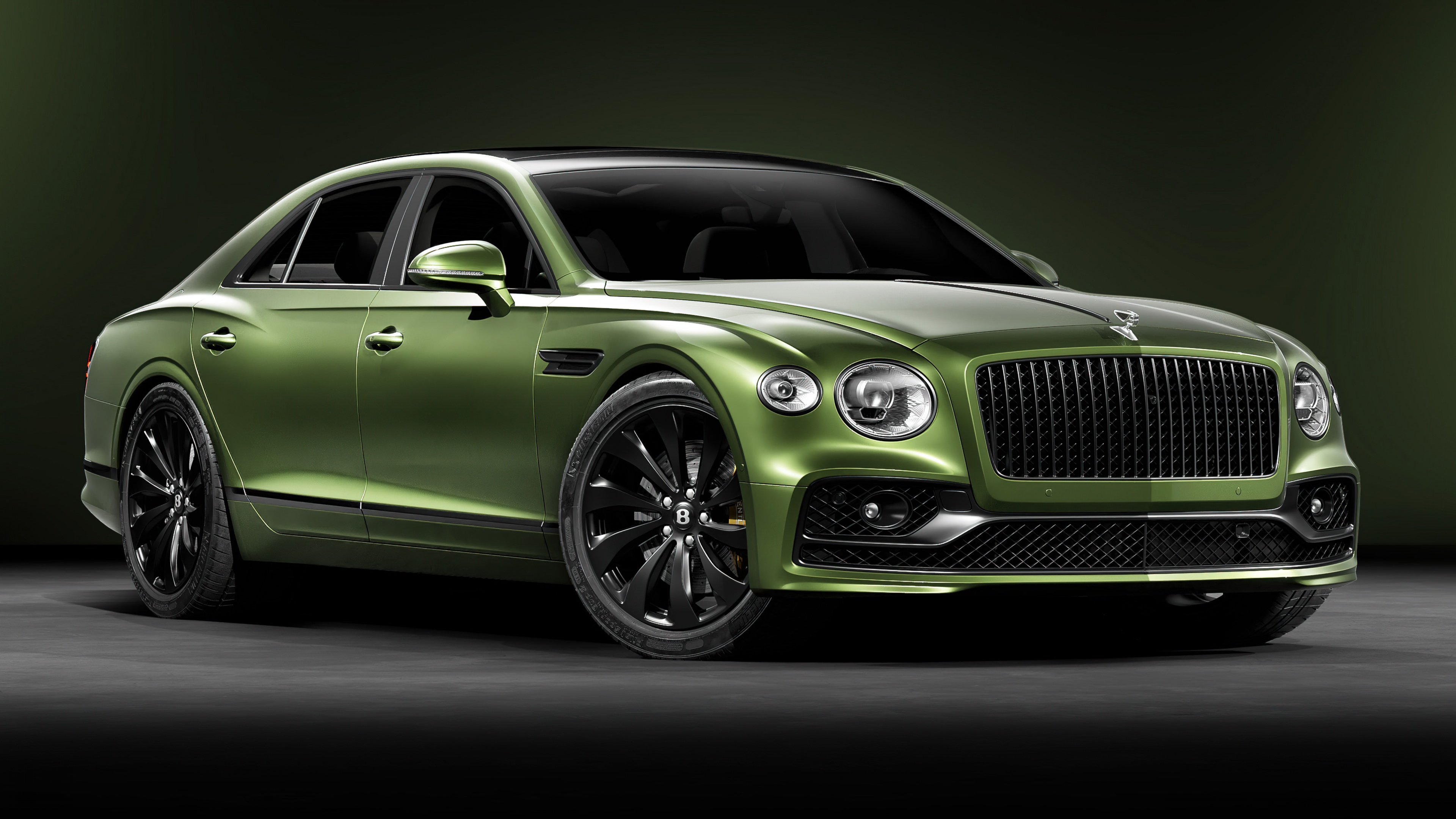 A luxury Bentley Flying Spur sedan with a deep green aesthetic and high-detail 5K finish.