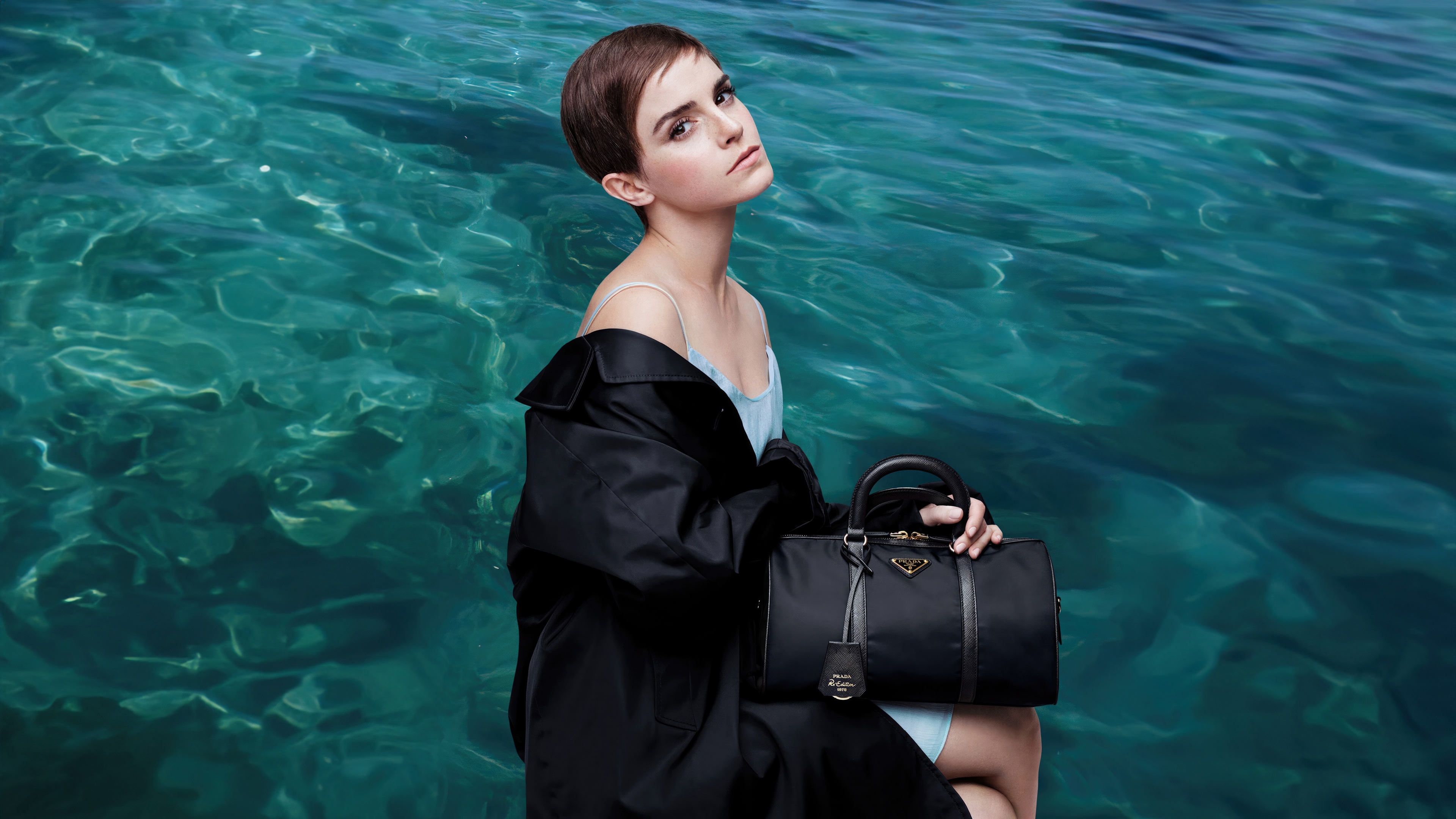 A high-resolution, elegant portrait of actress Emma Watson from a 2024 professional photoshoot.