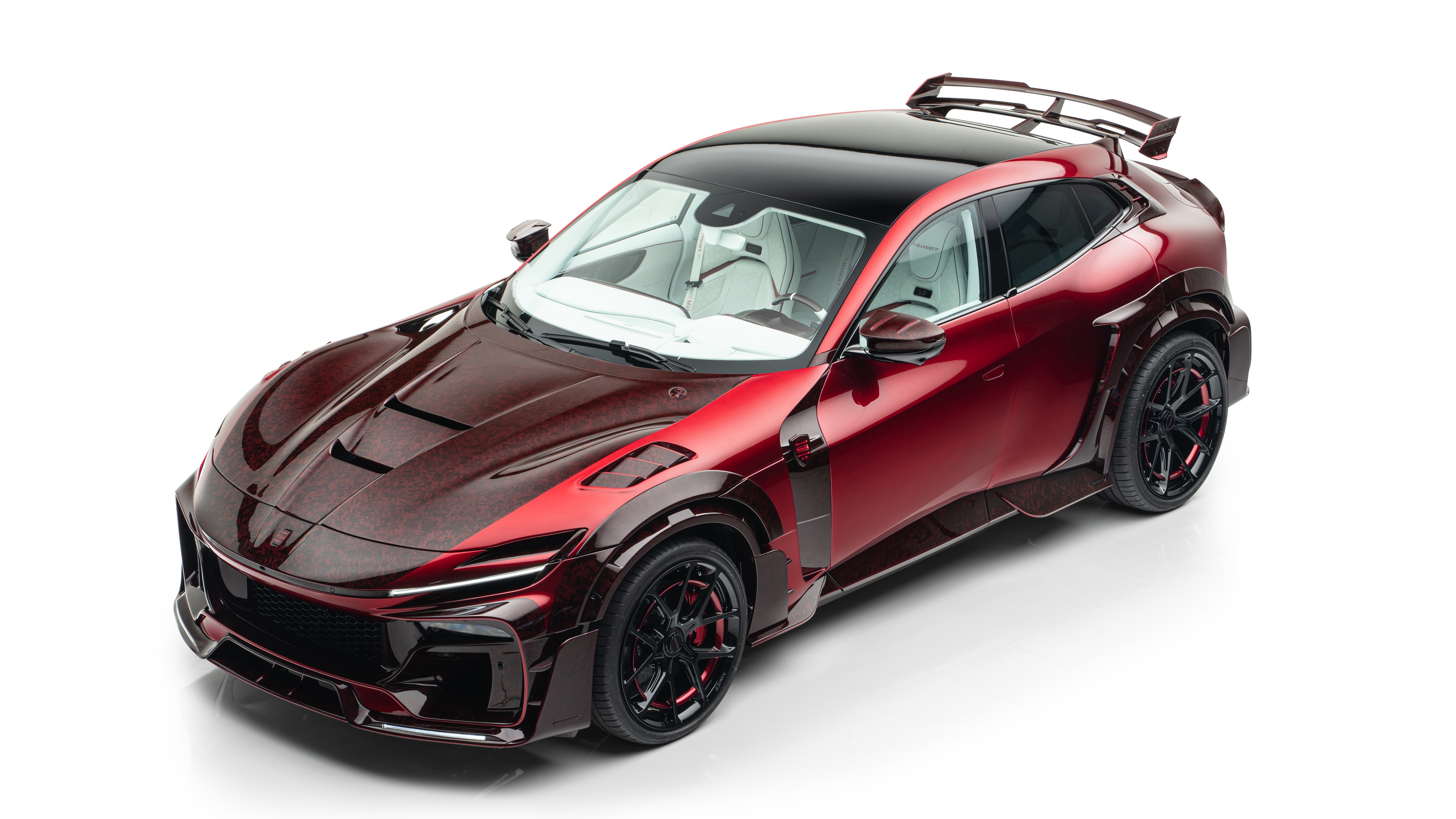 A high-resolution studio portrait of a Ferrari Purosangue luxury SUV isolated on a plain white background.