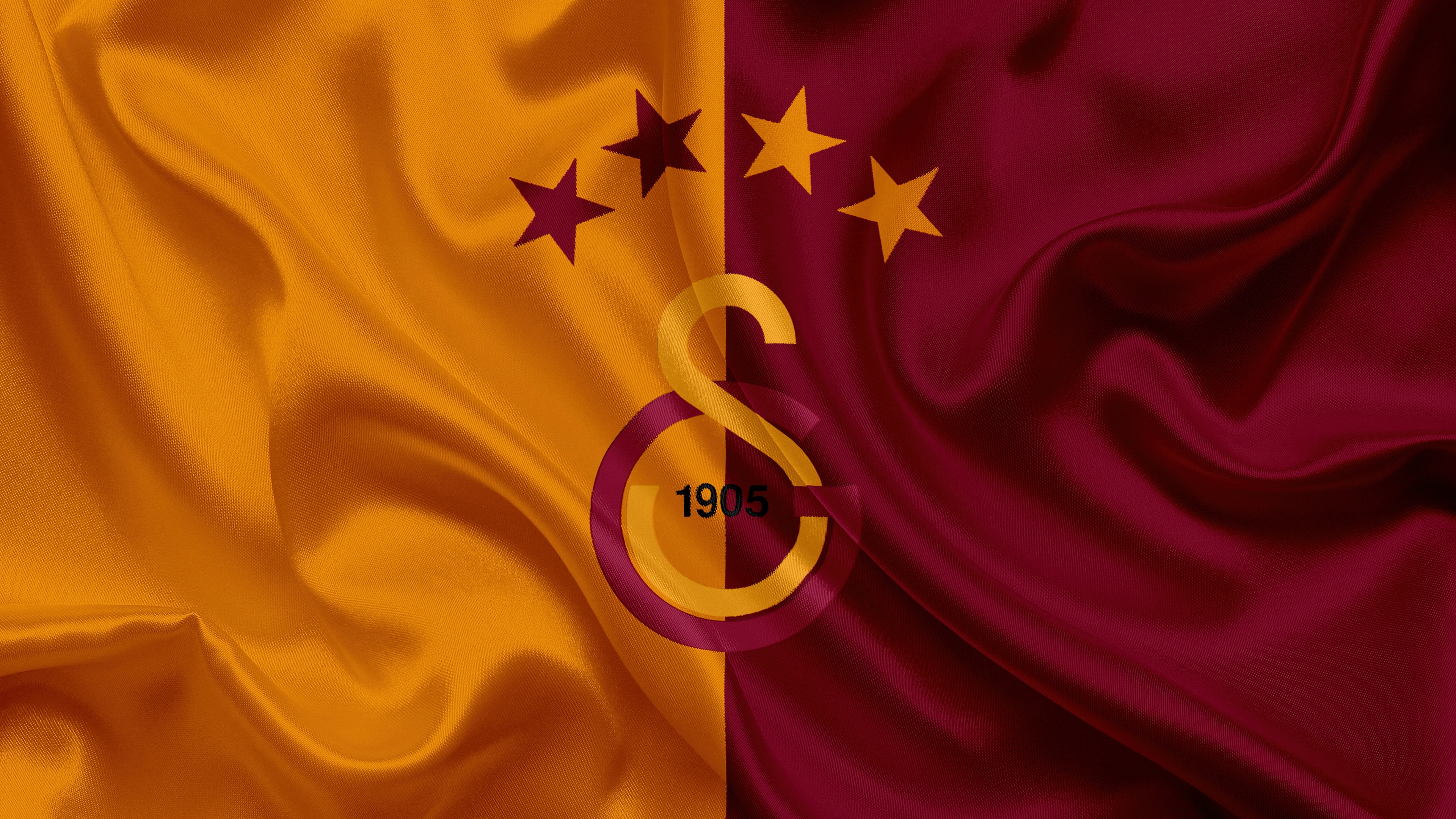 A high-quality 5K image representing the Galatasaray football club with its signature red and yellow colors.
