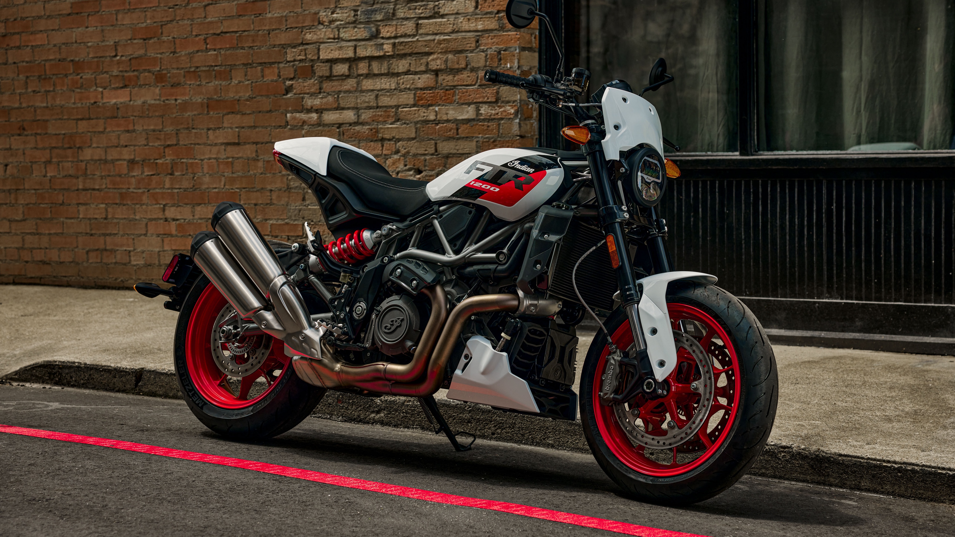 Close-up of sleek, colorful sport motorcycles designed for high-speed racing.