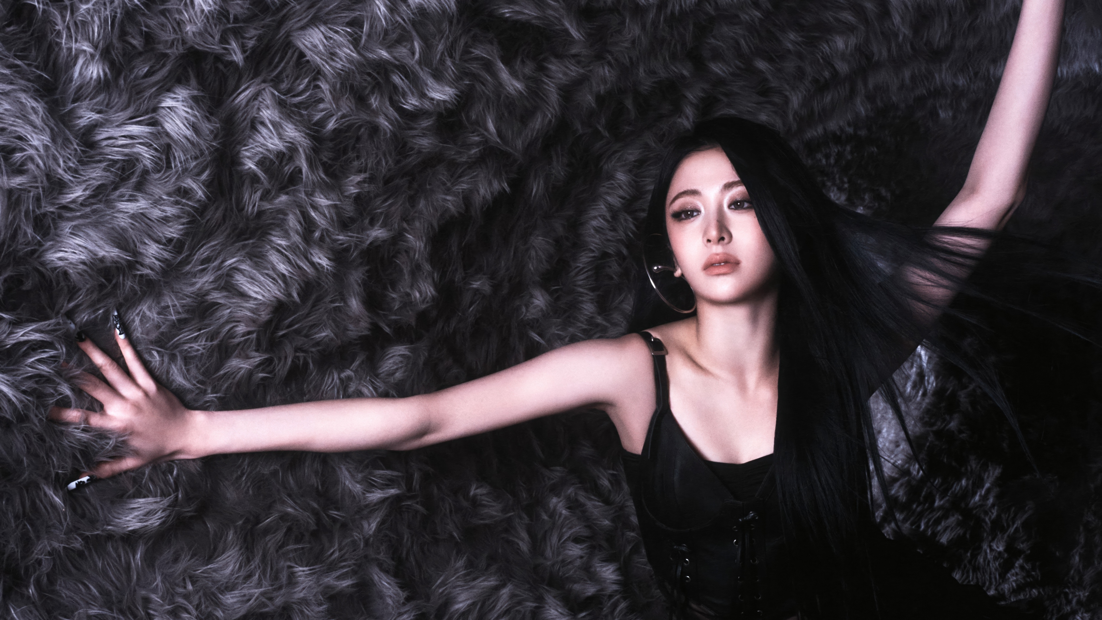 A high-resolution, stylish portrait of K-pop artist Huh Yunjin of Le Sserafim.