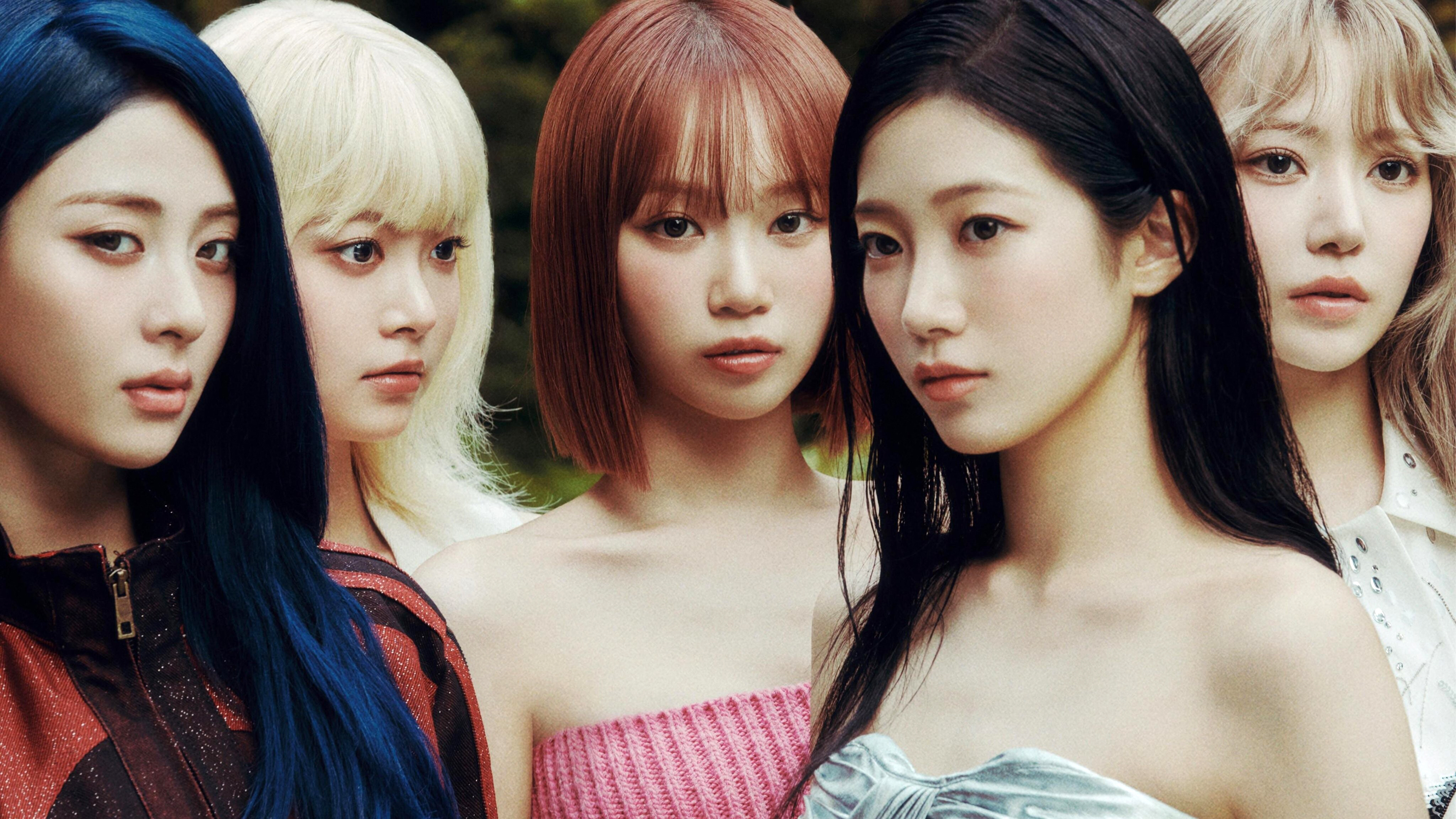 A high-fashion magazine cover featuring K-pop group Le Sserafim members Sakura Miyawaki, Kim Chaewon, Huh Yunjin, Hong Eunchae, and Kazuha.