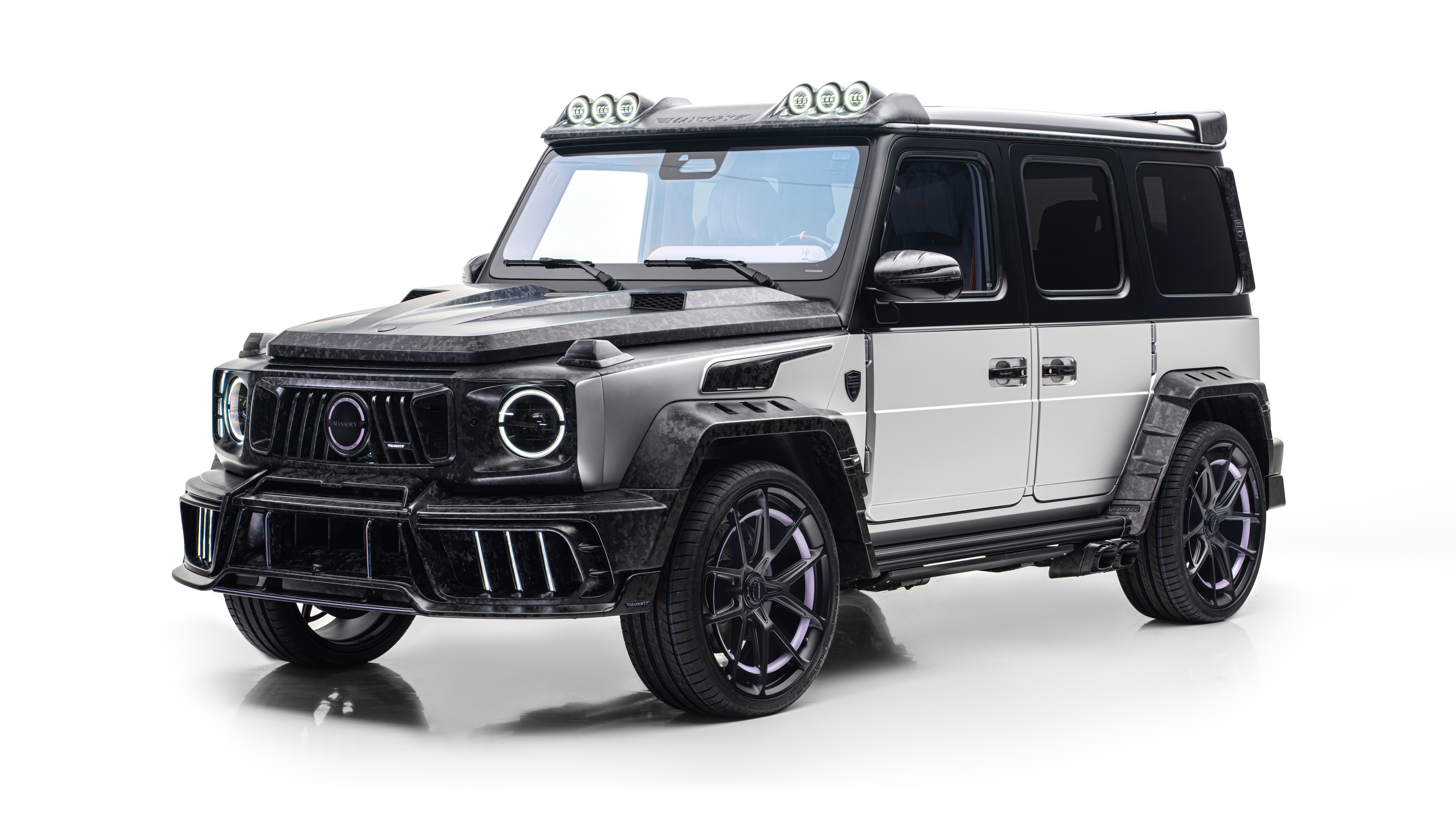 A pristine white Mercedes-AMG G 63 luxury SUV isolated on a plain white background.