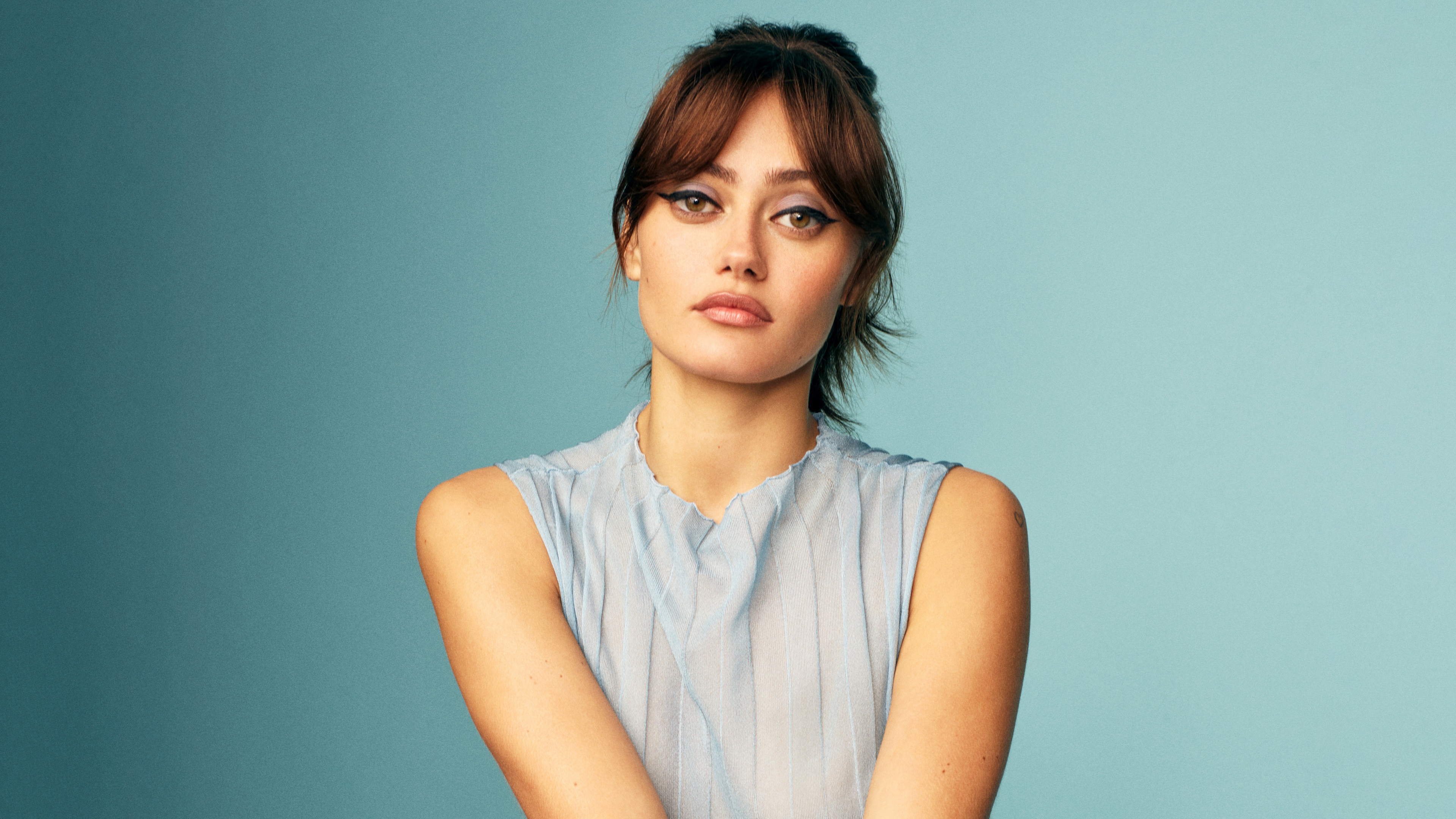 A highly detailed 8K close-up portrait of English actress Ella Purnell