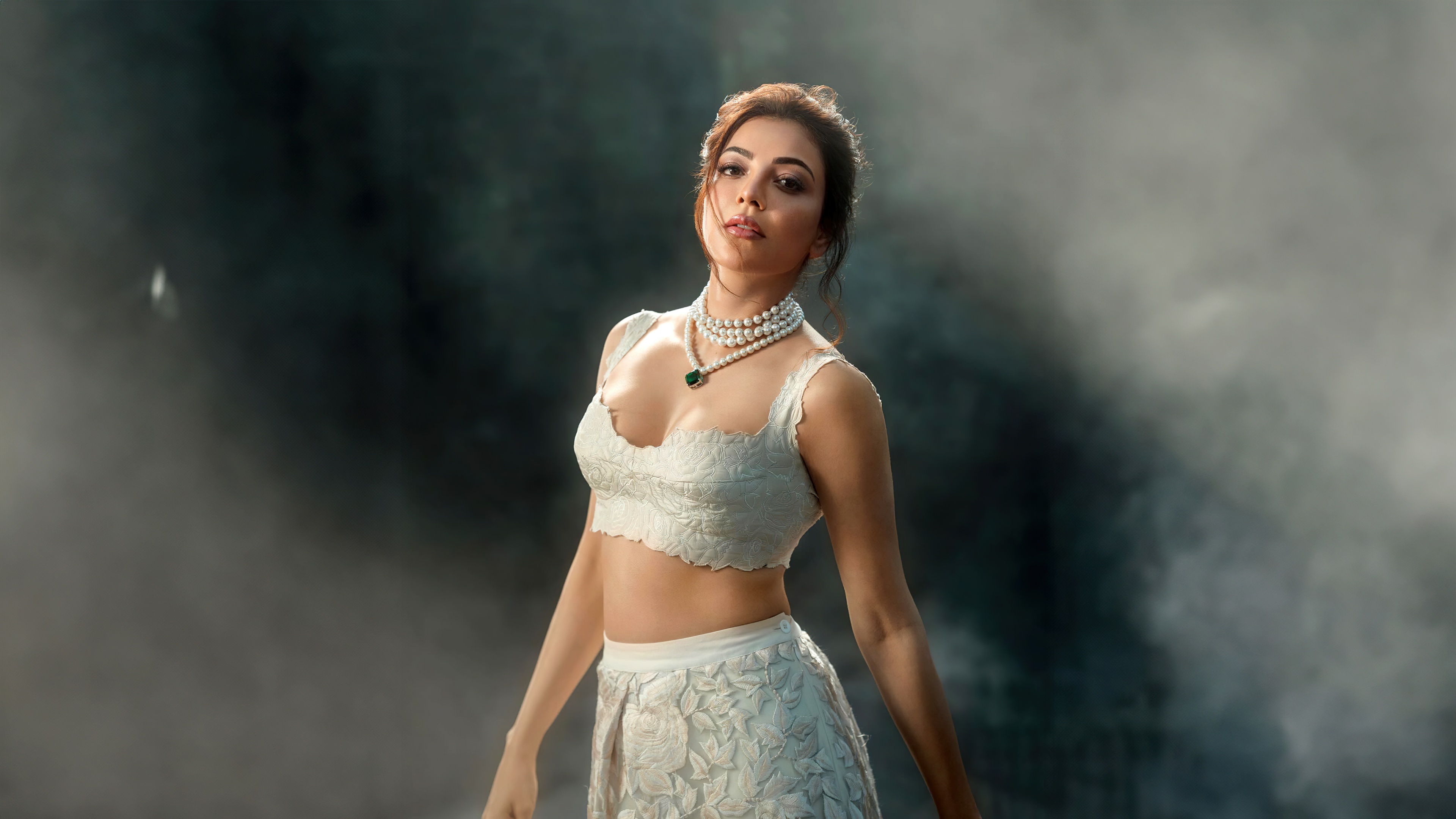 A beautiful and elegant portrait of Indian actress Kajal Aggarwal.
