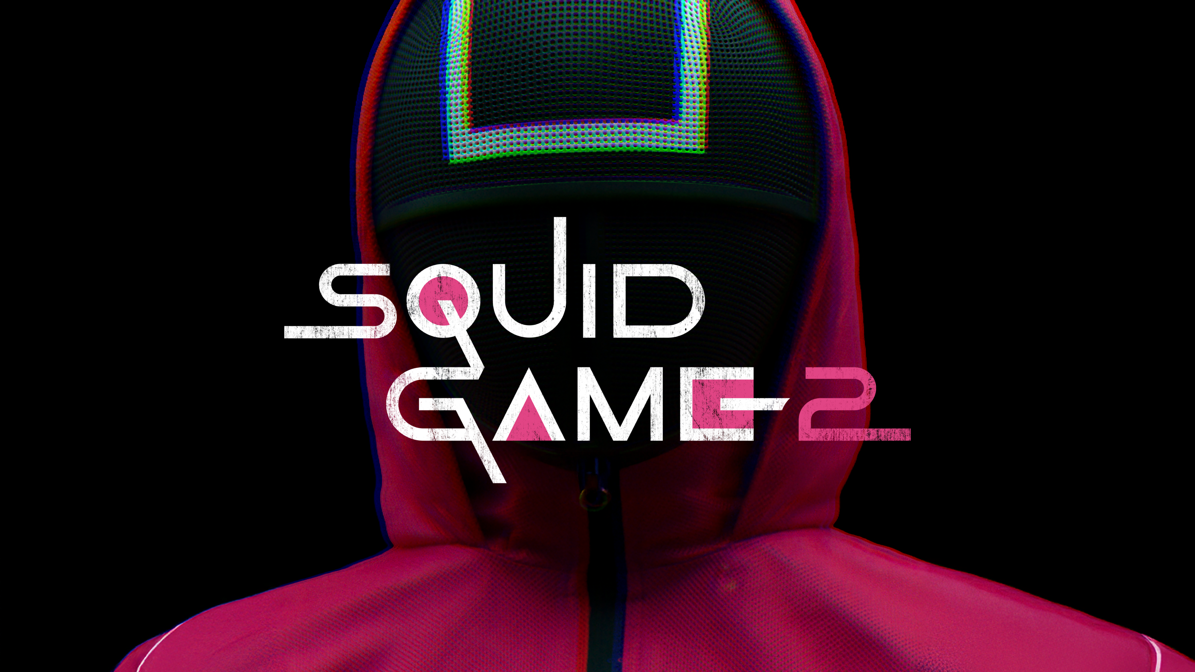 A mysterious masked guard from Squid Game Season 2 wearing a pink jumpsuit against a black background.