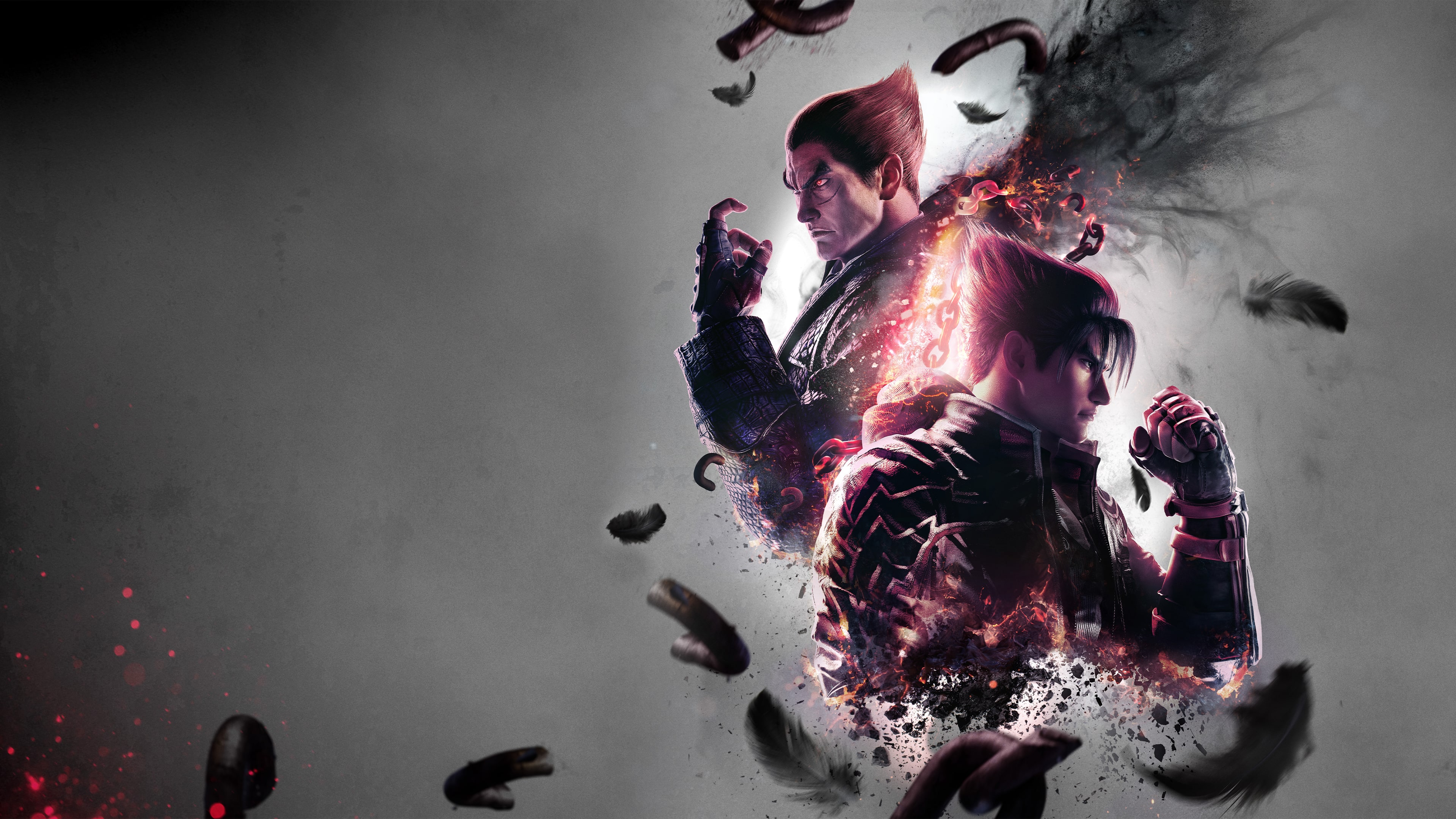 A dramatic key art depiction of Jin Kazama and Kazuya Mishima from Tekken 8 facing each other.