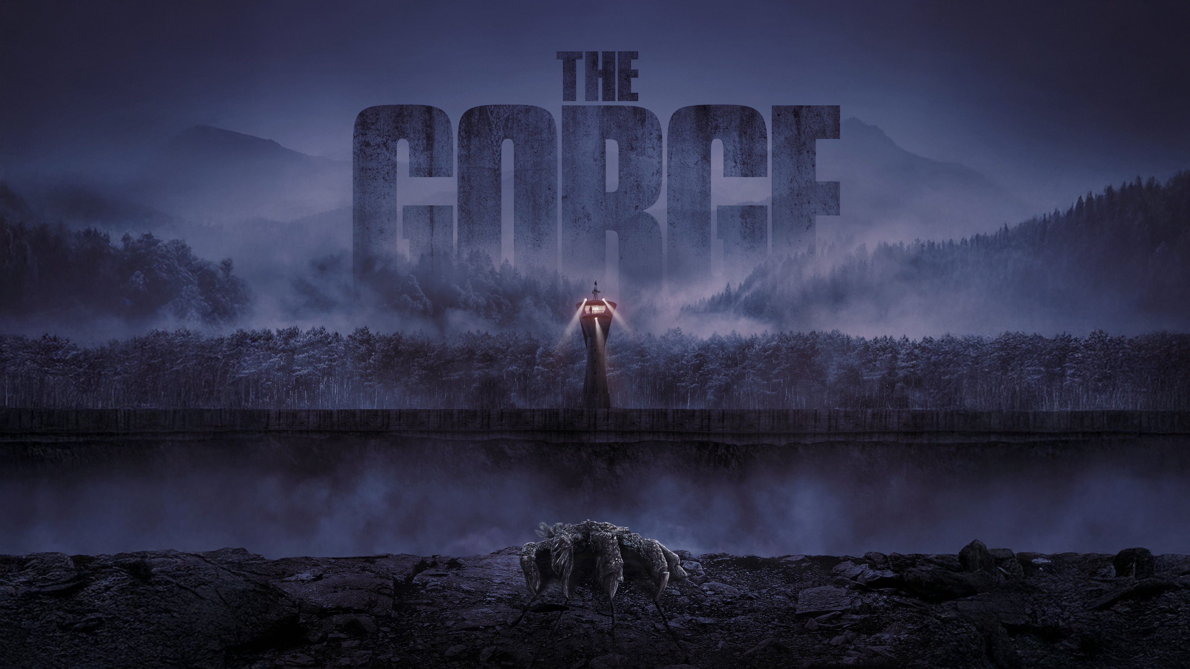 A dramatic cinematic frame from the movie The Gorge, showing a character in a moment of suspense against a backdrop of a deep, misty canyon.
