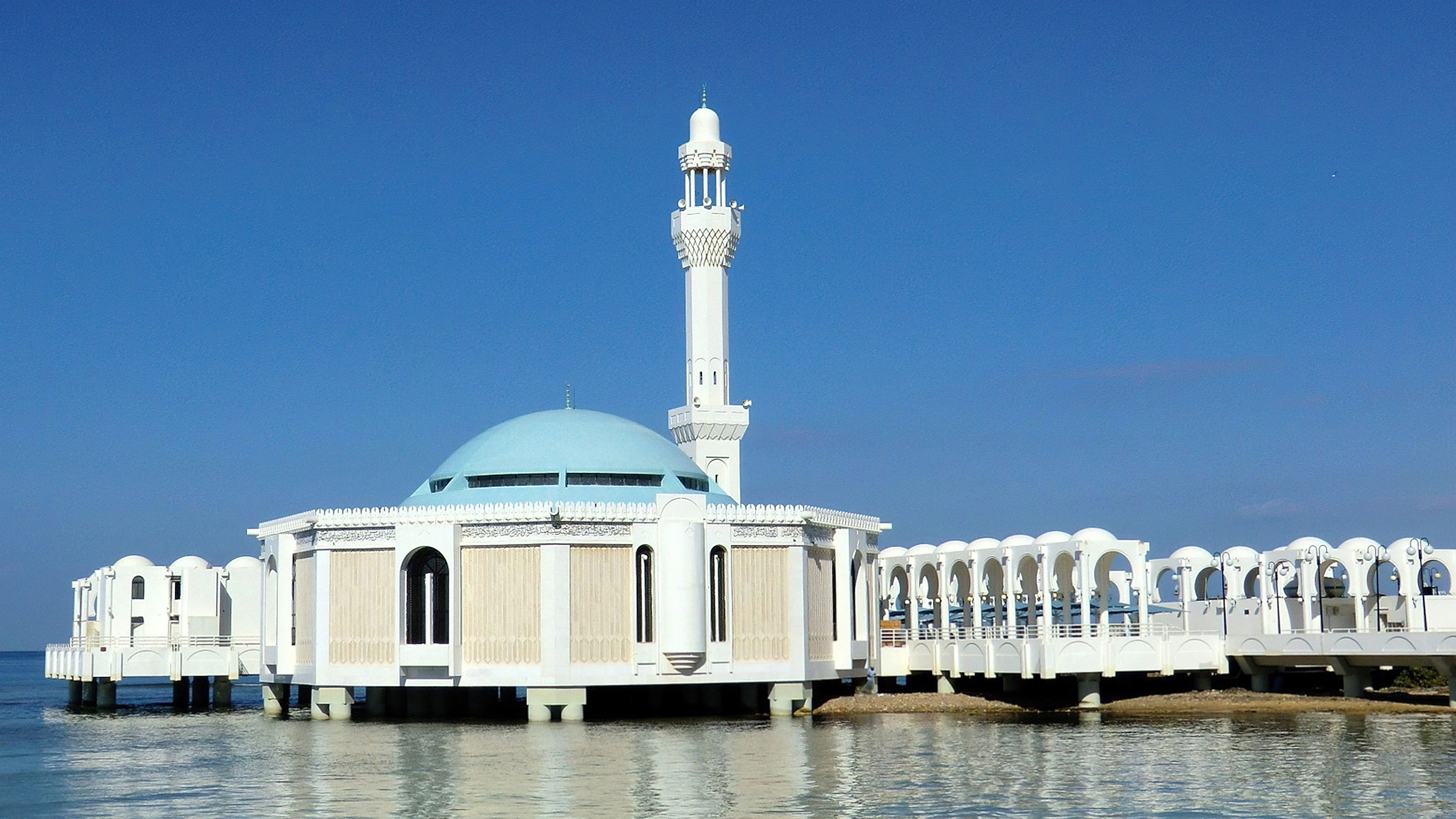 A surreal view of floating Islamic mosques and minarets drifting over a mystical desert landscape.