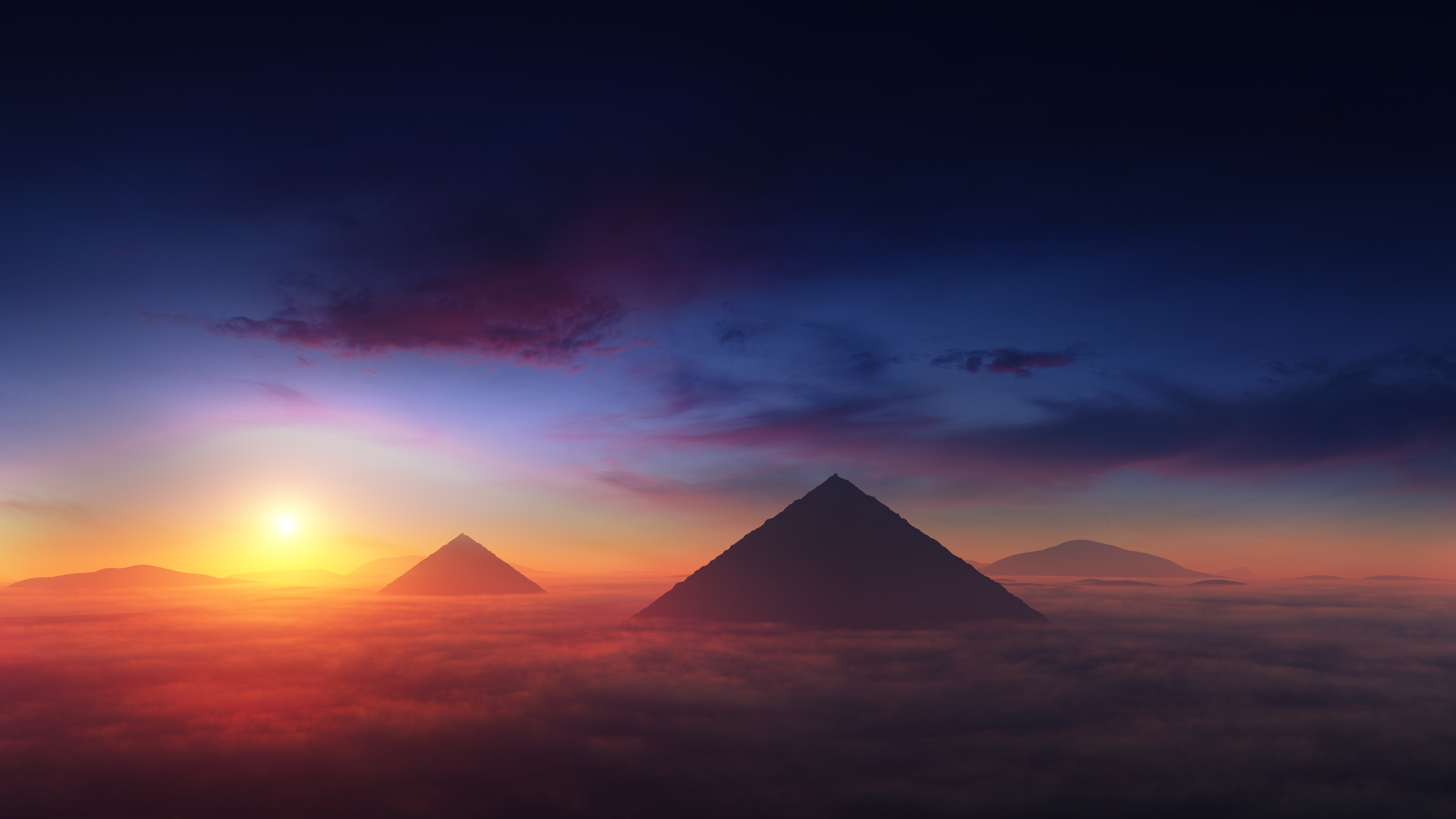 The Great Pyramids of Giza illuminated by a vibrant sunrise in the Egyptian desert.