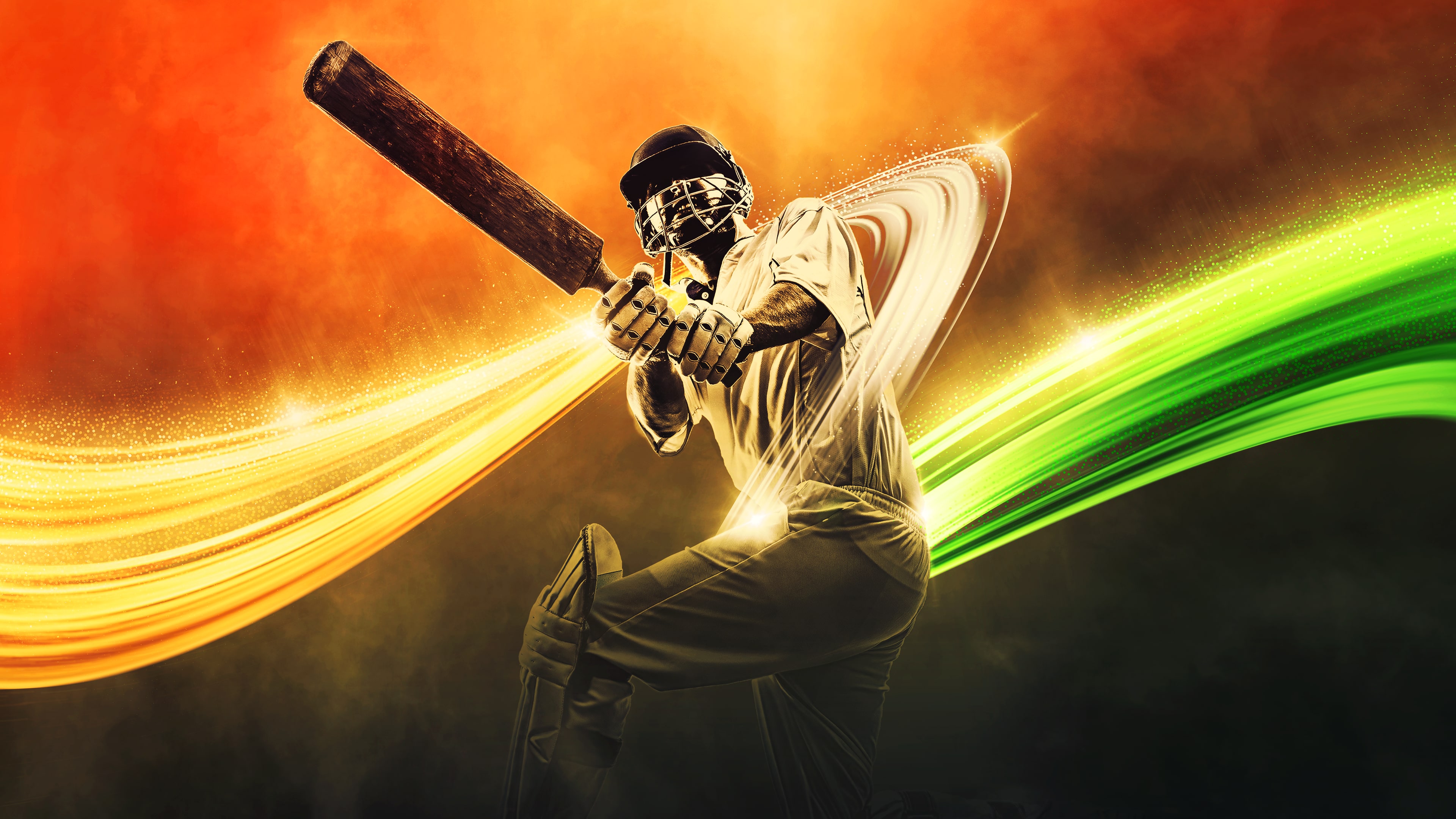 An Indian batsman holding a cricket bat with the Indian national flag waving behind him.