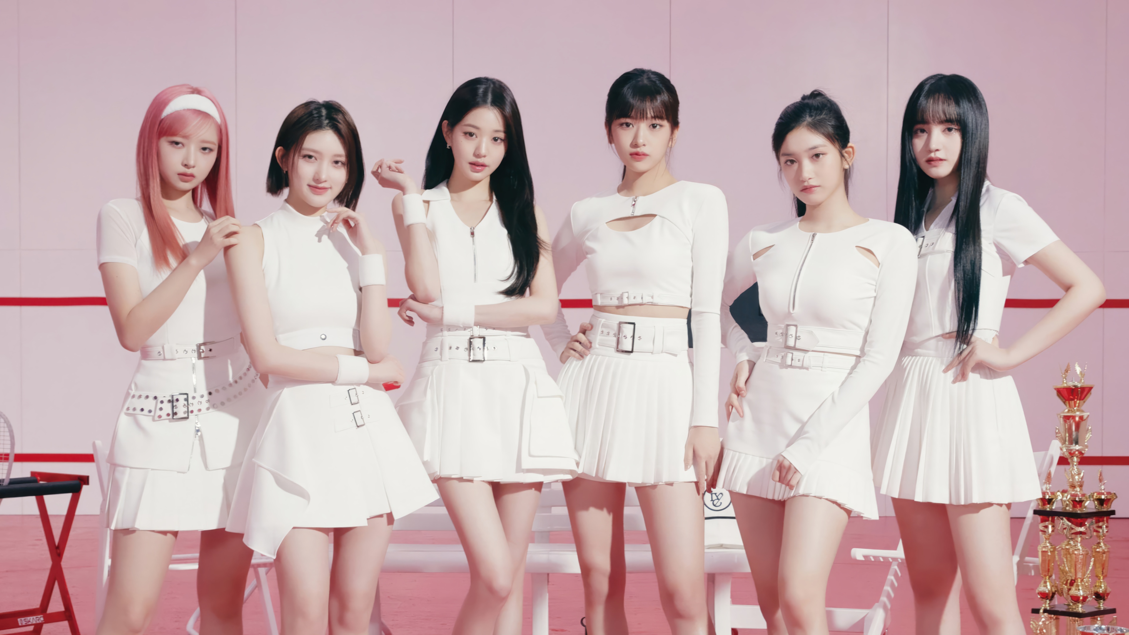 A group portrait of the K-pop girl group IVE, featuring members An Yujin, Gaeul, Rei, Jang Wonyoung, Liz, and Leeseo.