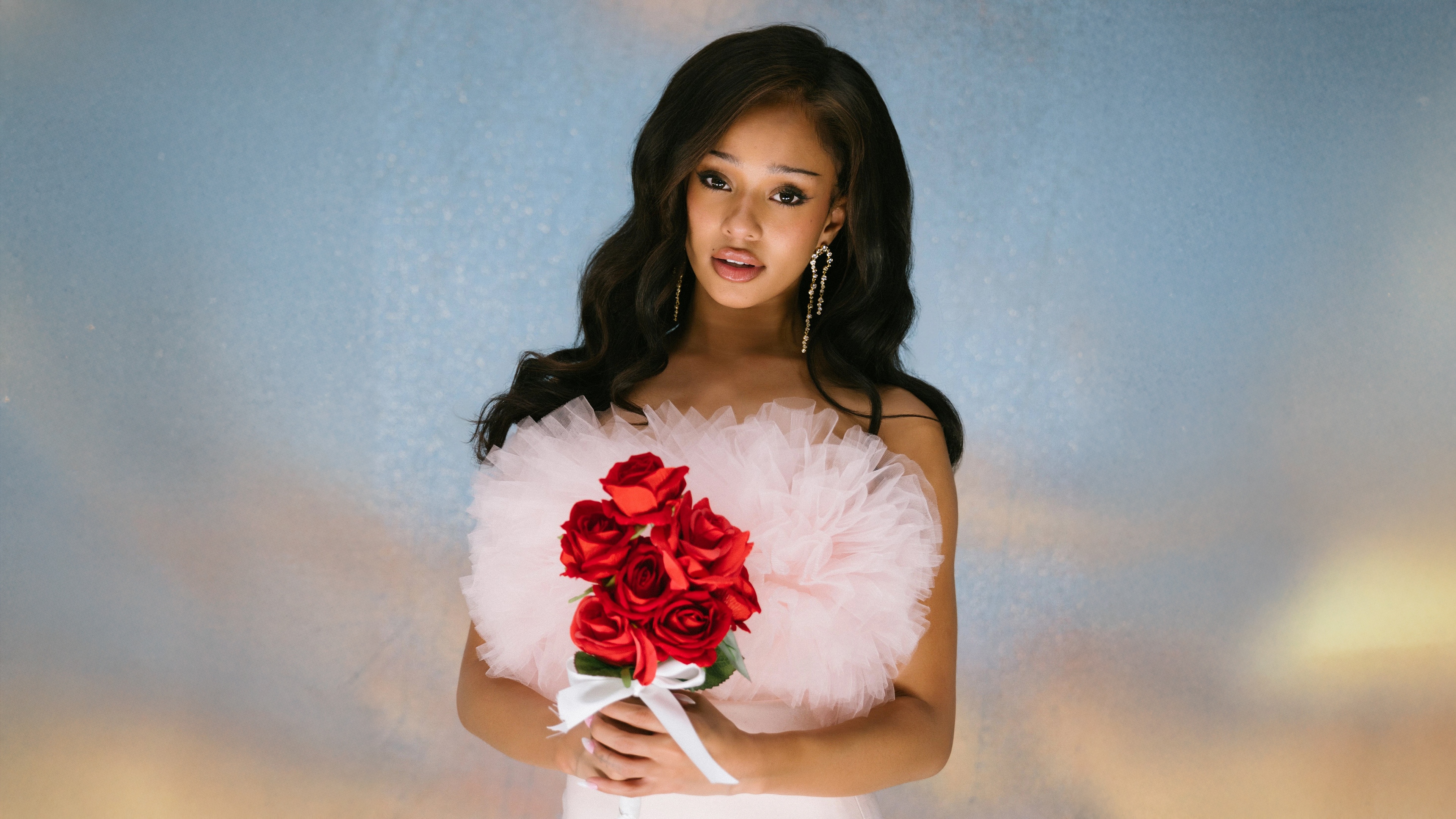 A high-resolution portrait of Manon from Street Fighter wearing a flowing pink dress and surrounded by lush red roses.