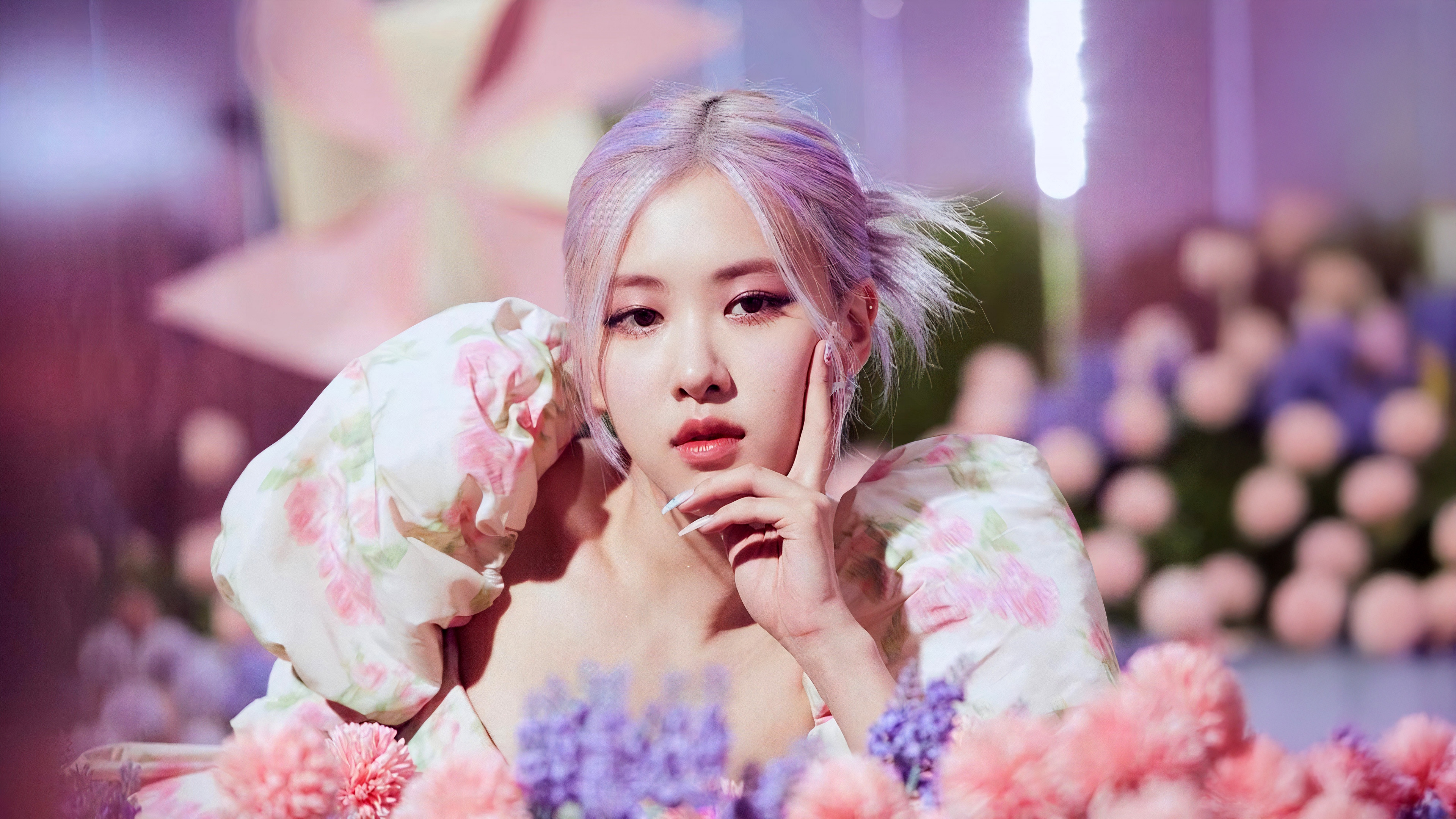 A cinematic portrait of Rosé from BLACKPINK featuring a soft pink and purple aesthetic