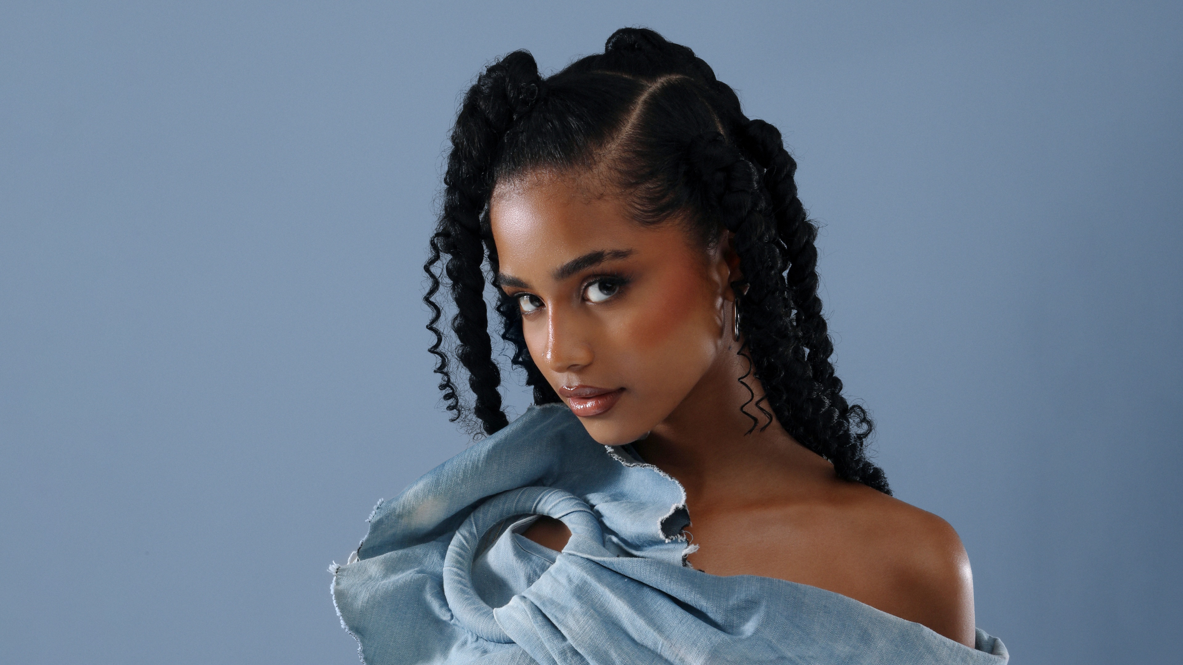A high-definition, detailed portrait of South African singer Tyla.