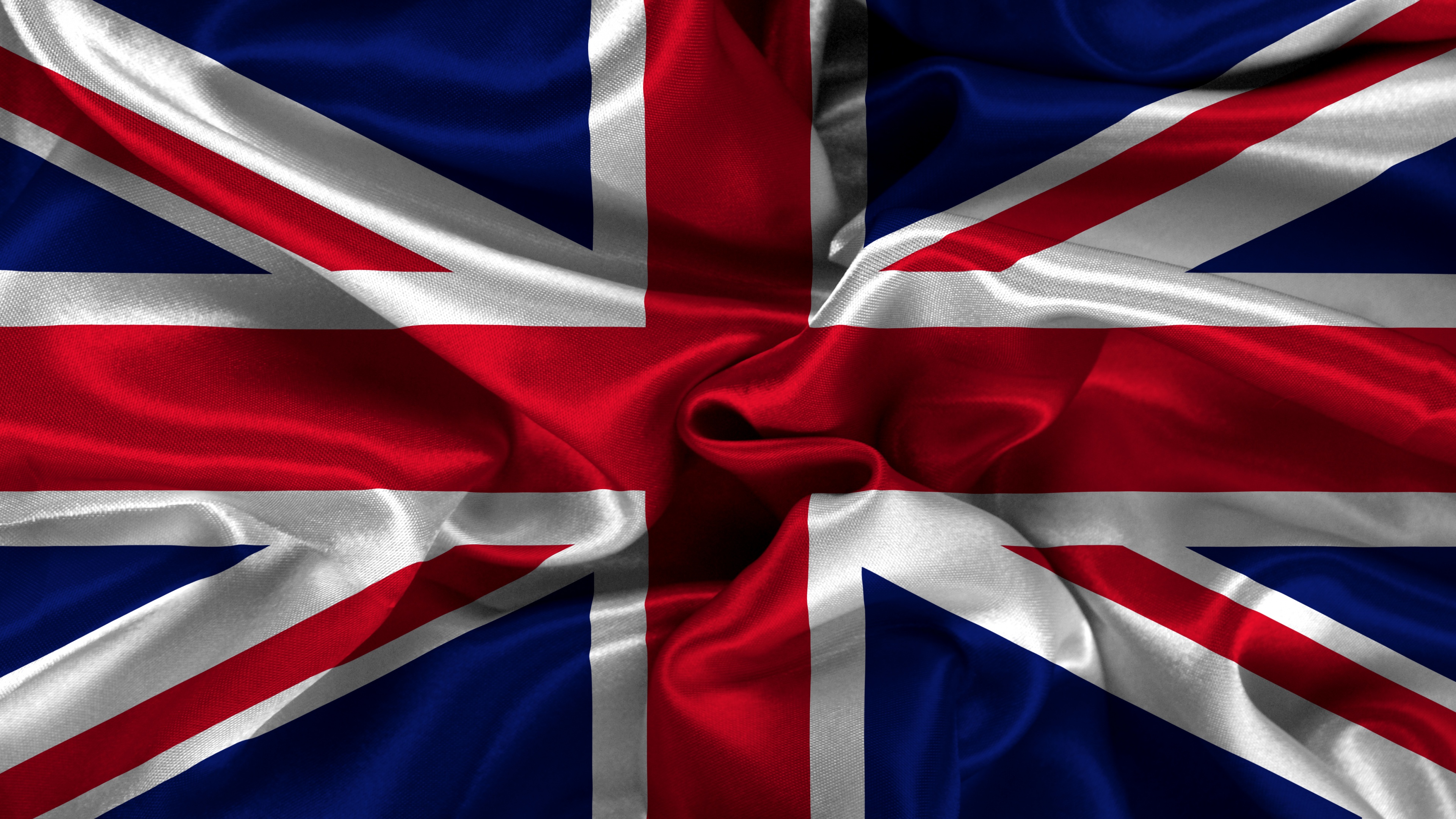 A high-resolution 5K close-up of the British Union Jack flag.