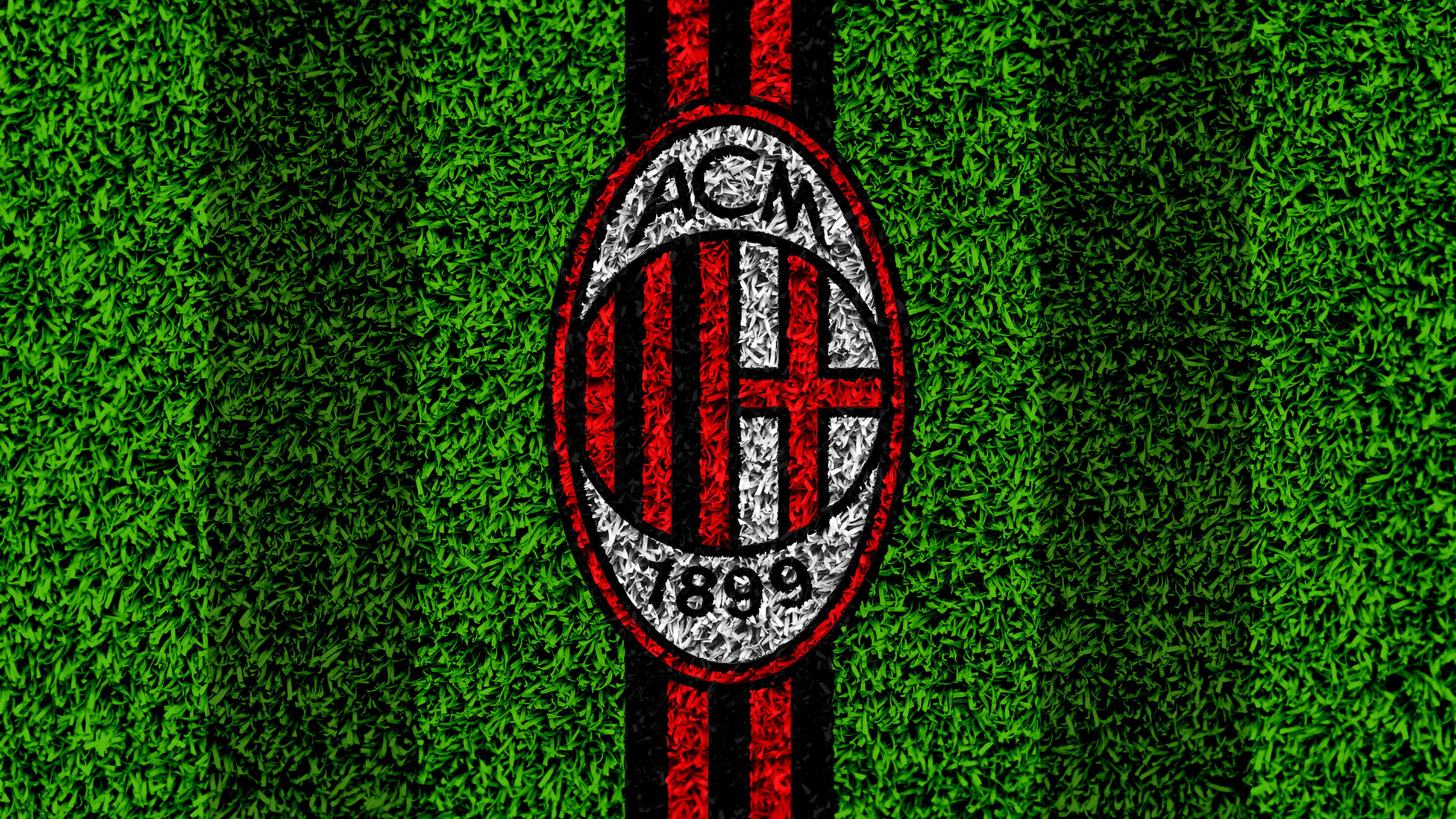 The AC Milan football club emblem showcased on a vibrant green background, representing Italian football excellence.