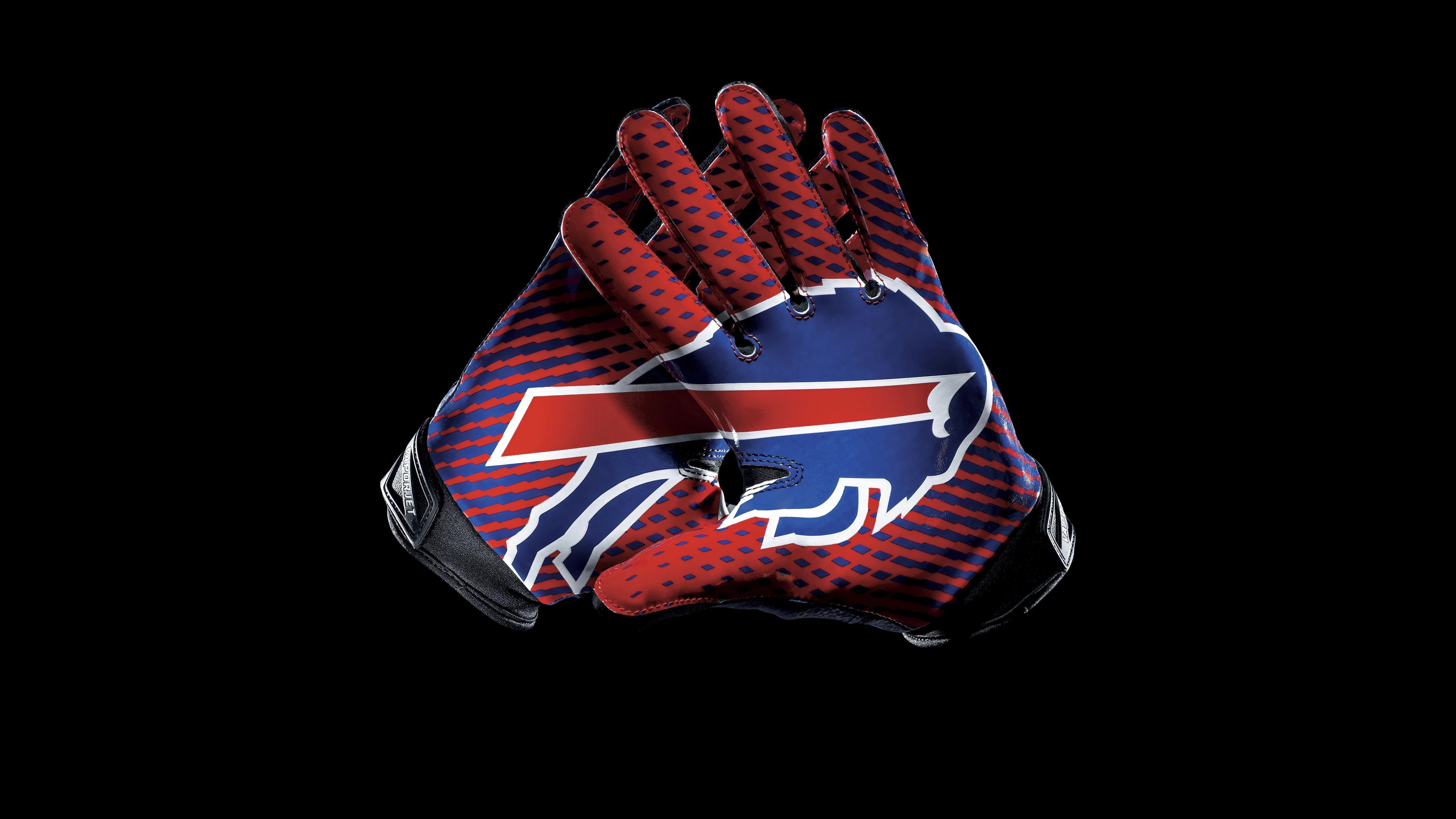 A high-resolution close-up of Buffalo Bills football gloves on a solid black background.