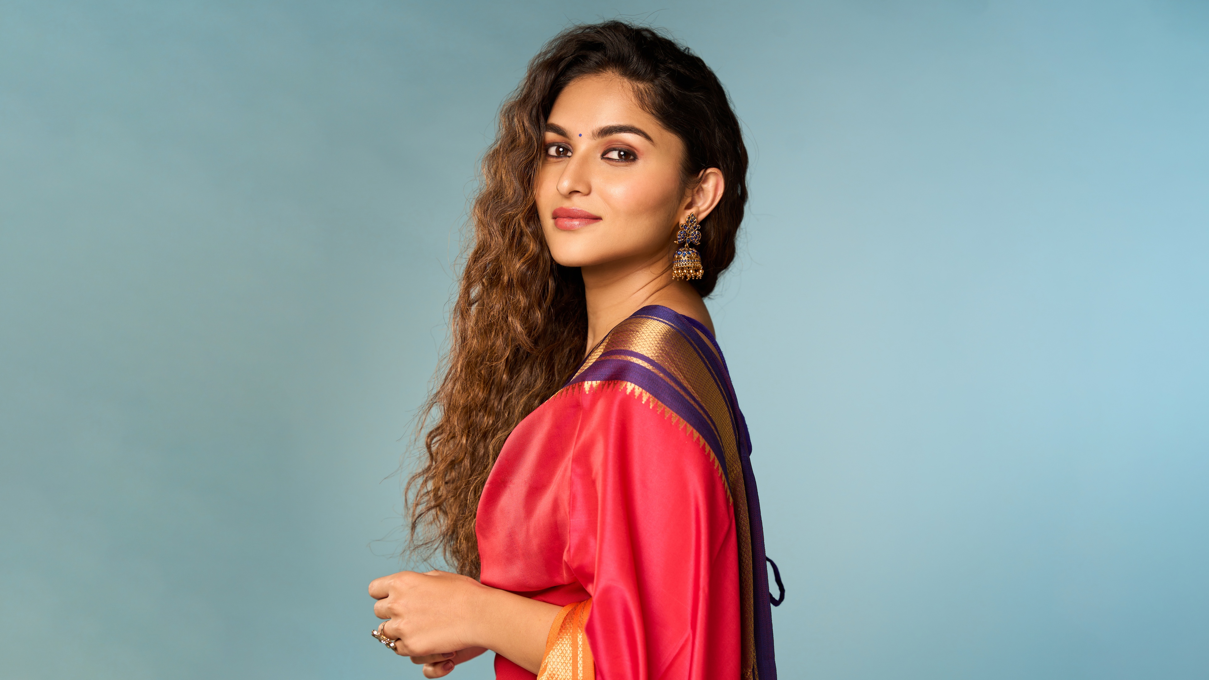 A high-resolution, graceful portrait of Indian actress Kayadu Lohar wearing an elegant traditional saree.