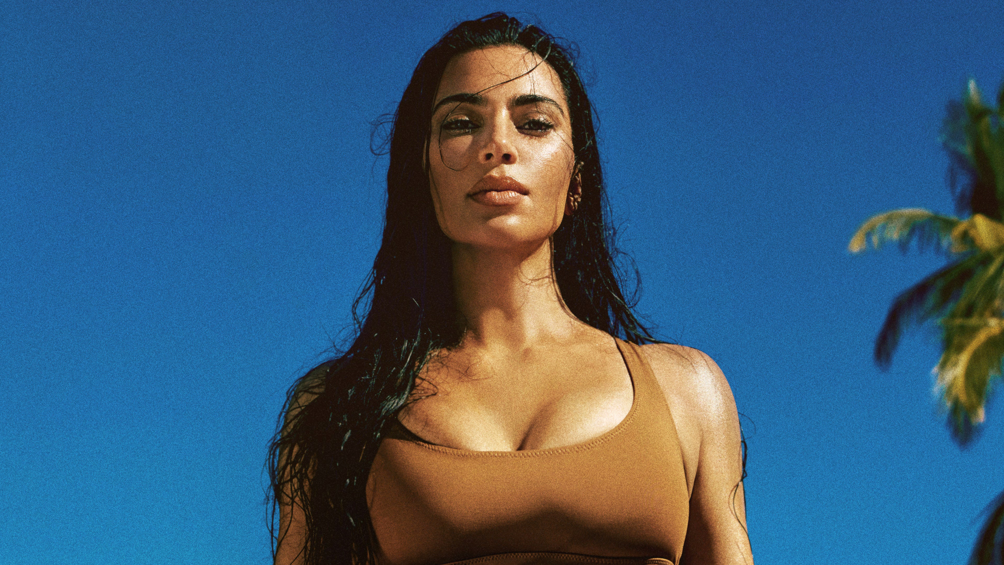 A luxurious and high-fashion portrait of American celebrity Kim Kardashian.