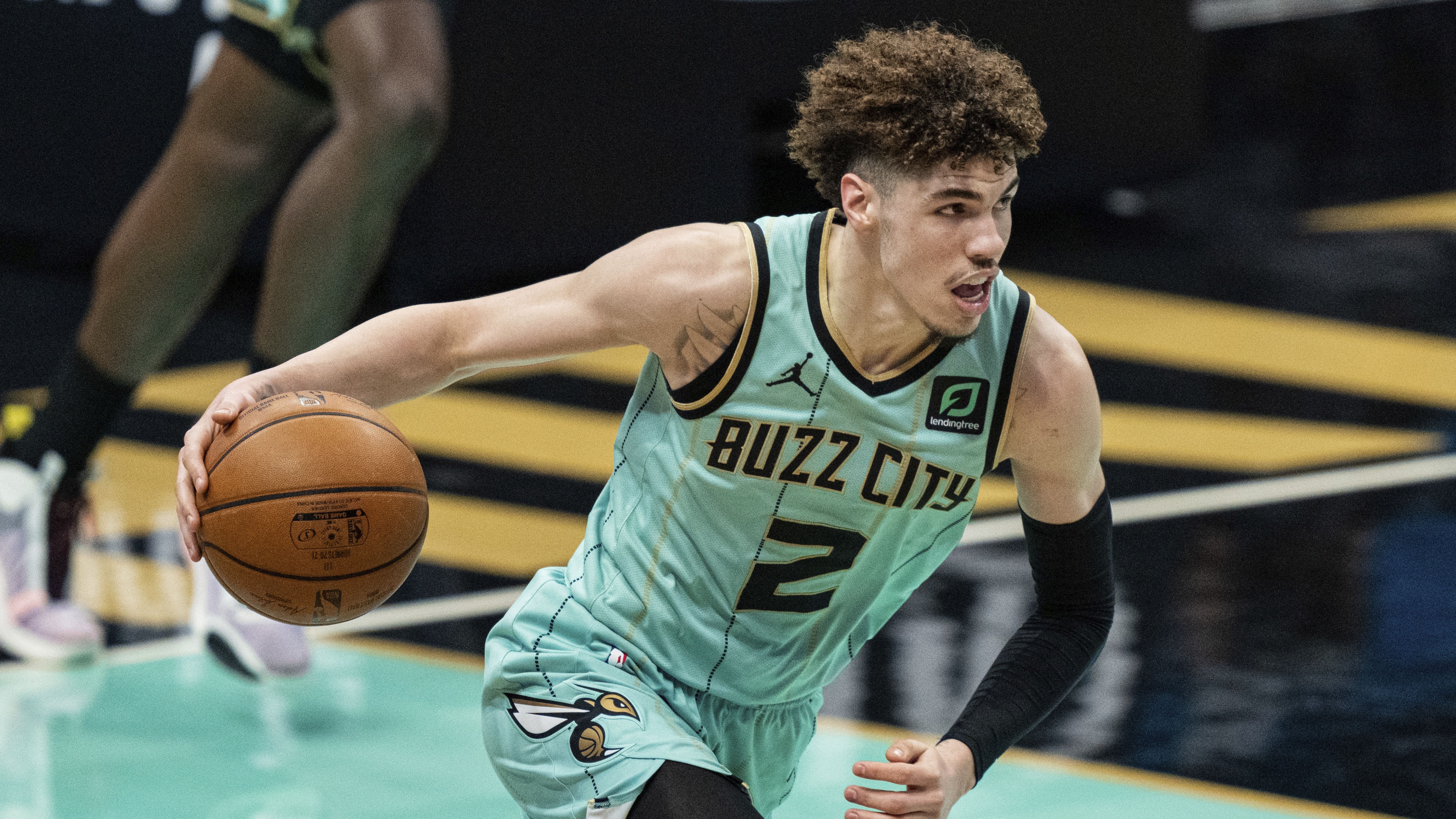A high-resolution, cinematic portrait of NBA basketball player LaMelo Ball.
