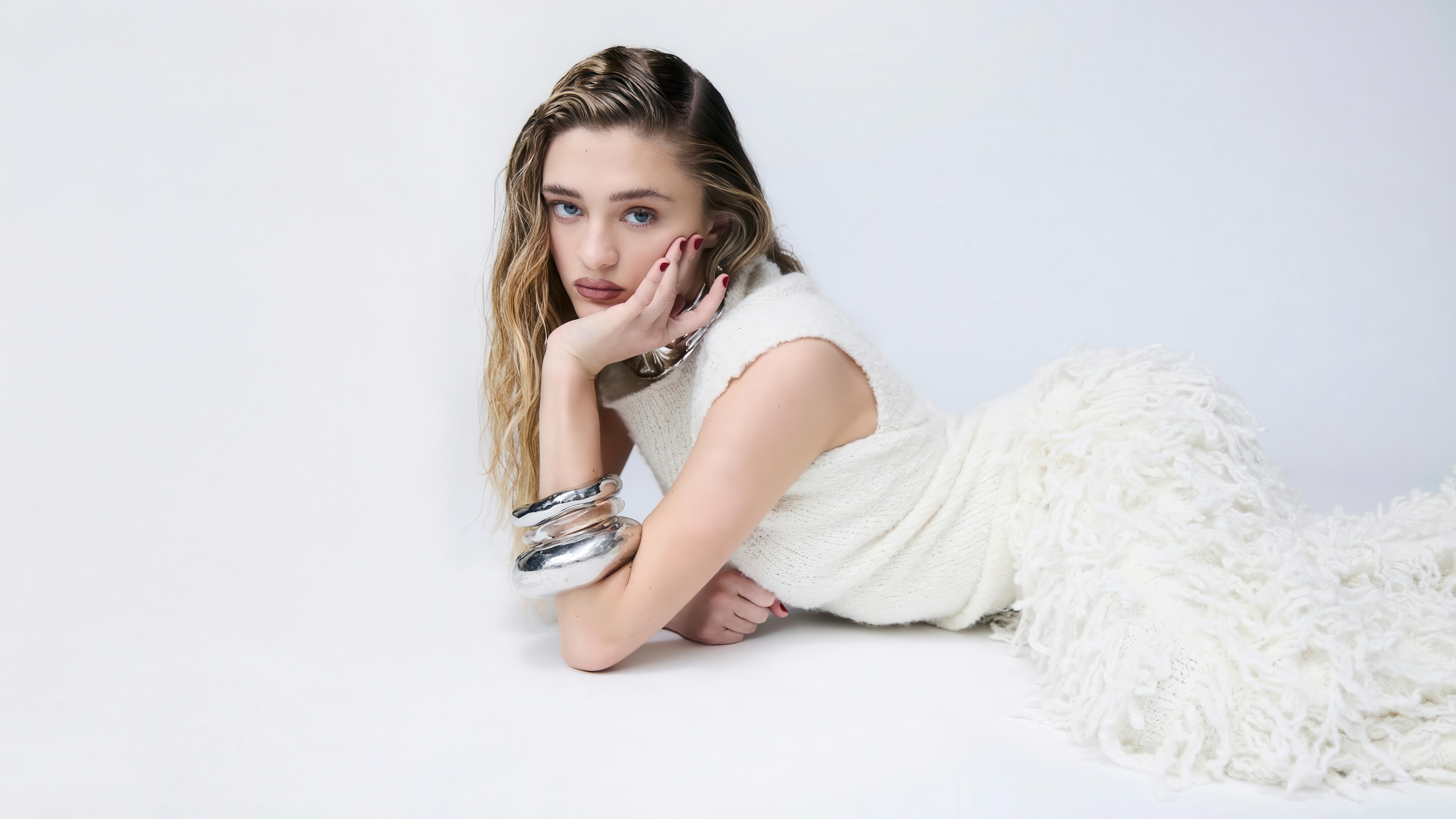 A high-resolution 5K portrait of American actress Lizzy Greene with a bright white aesthetic.