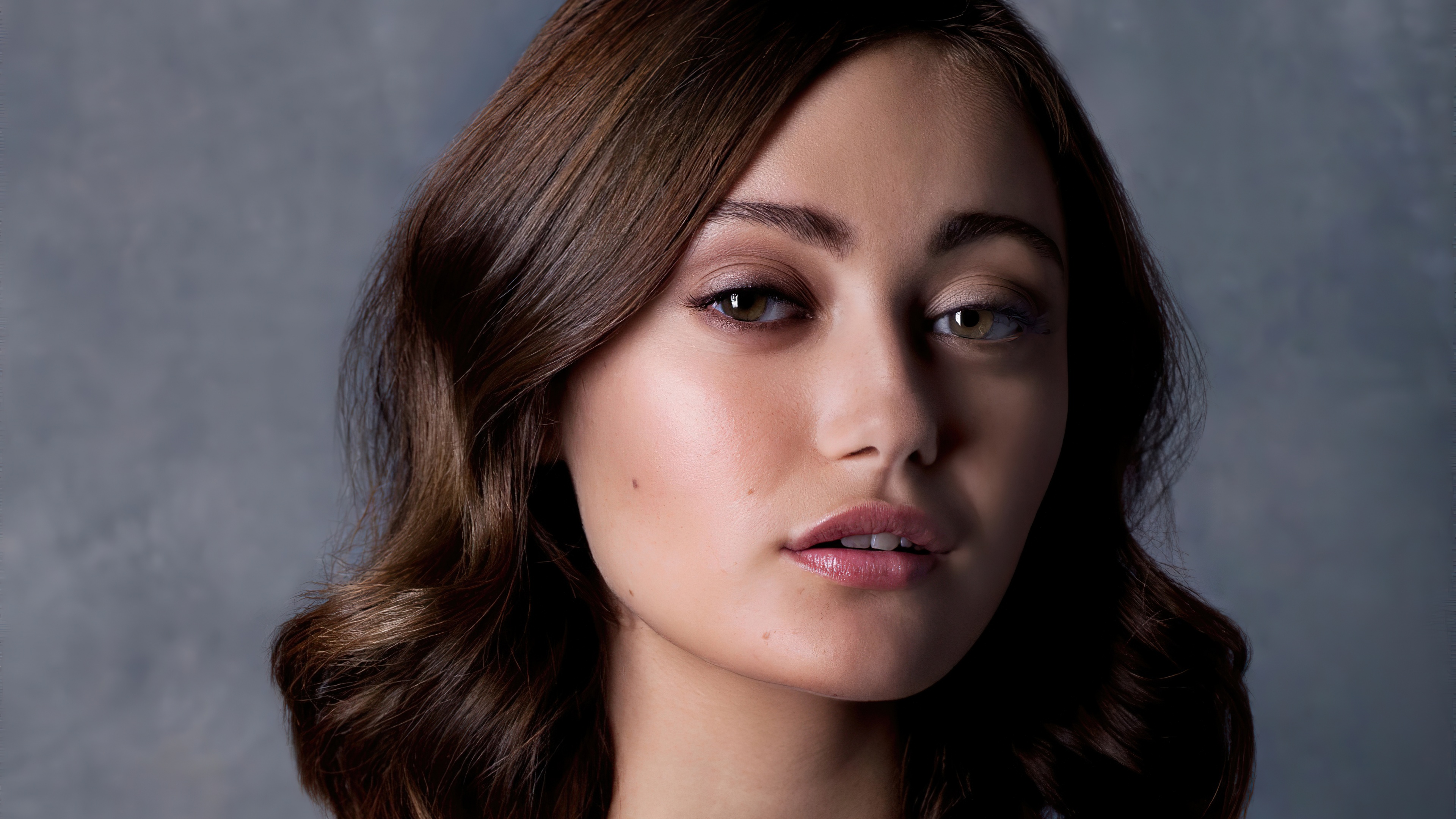 A detailed close-up portrait of English actress Ella Purnell.