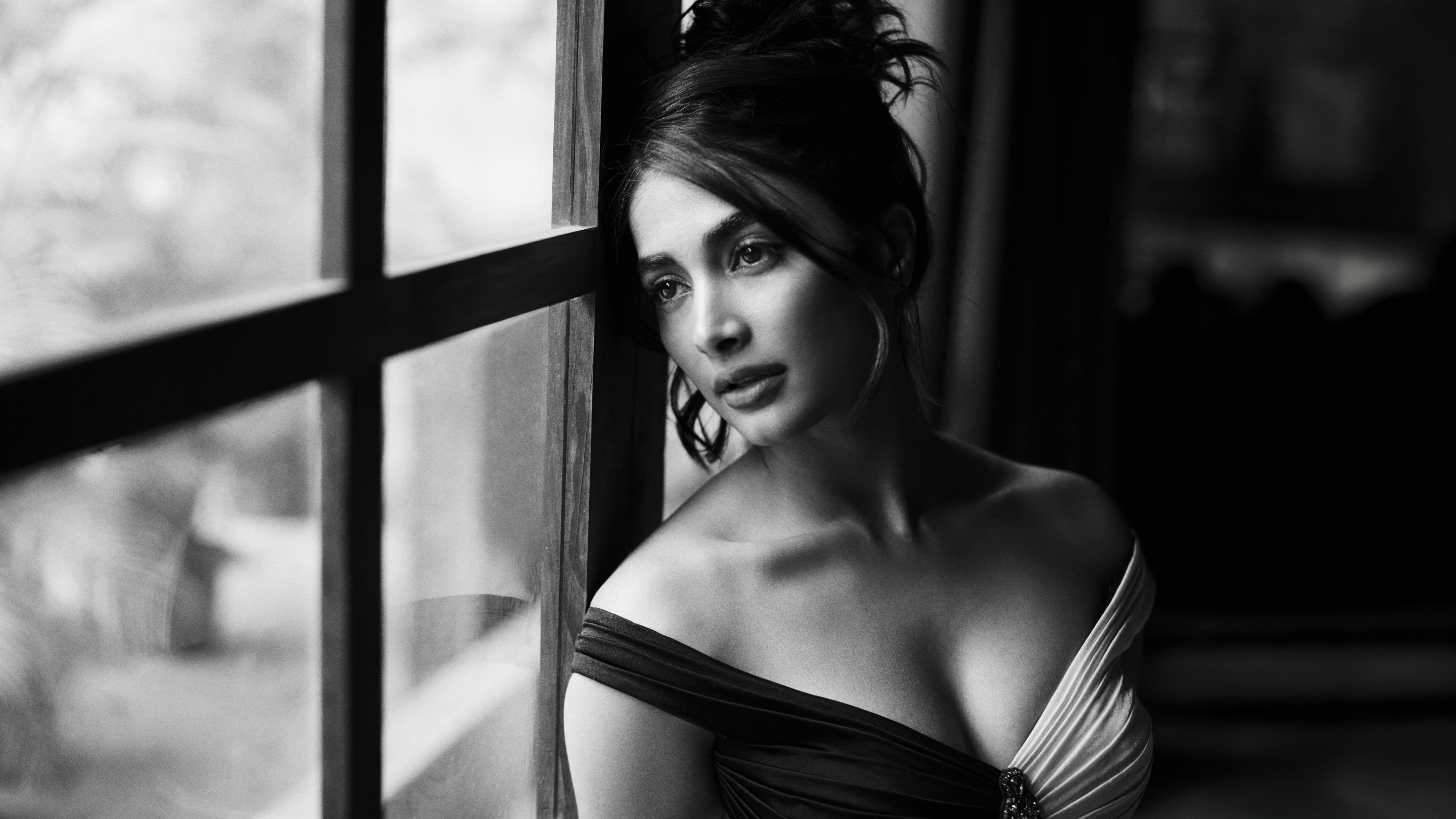 Black and white close-up portrait of Indian actress Pooja Hegde