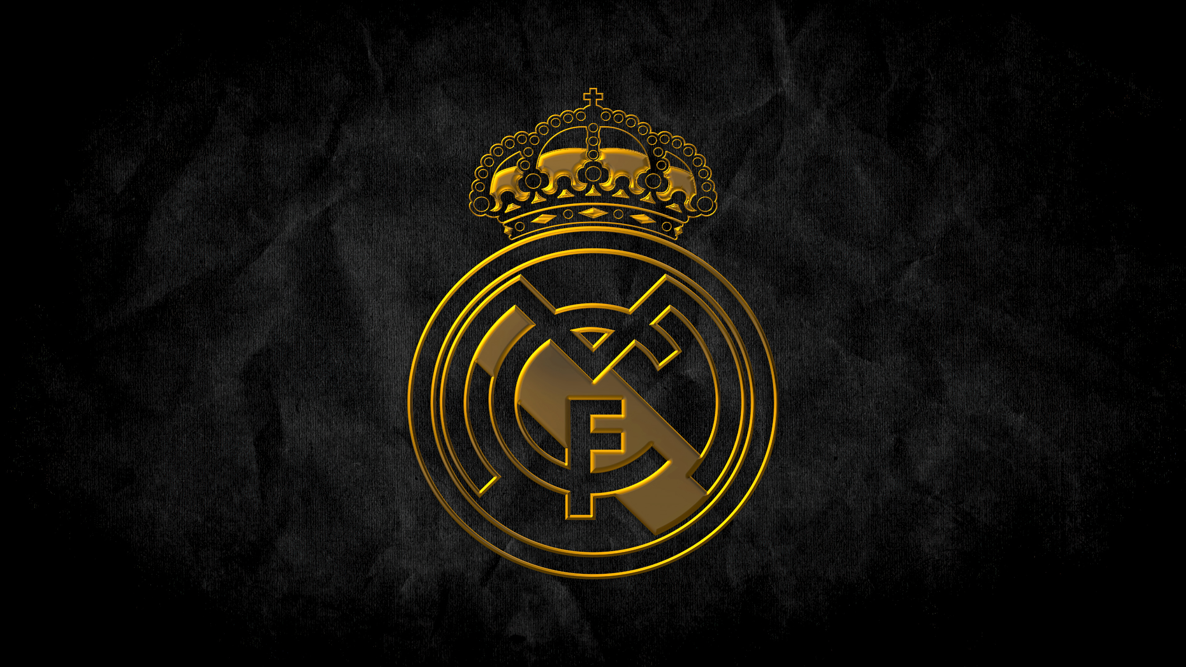 The official logo of Real Madrid CF football club prominently displayed on a dark, minimalist background.