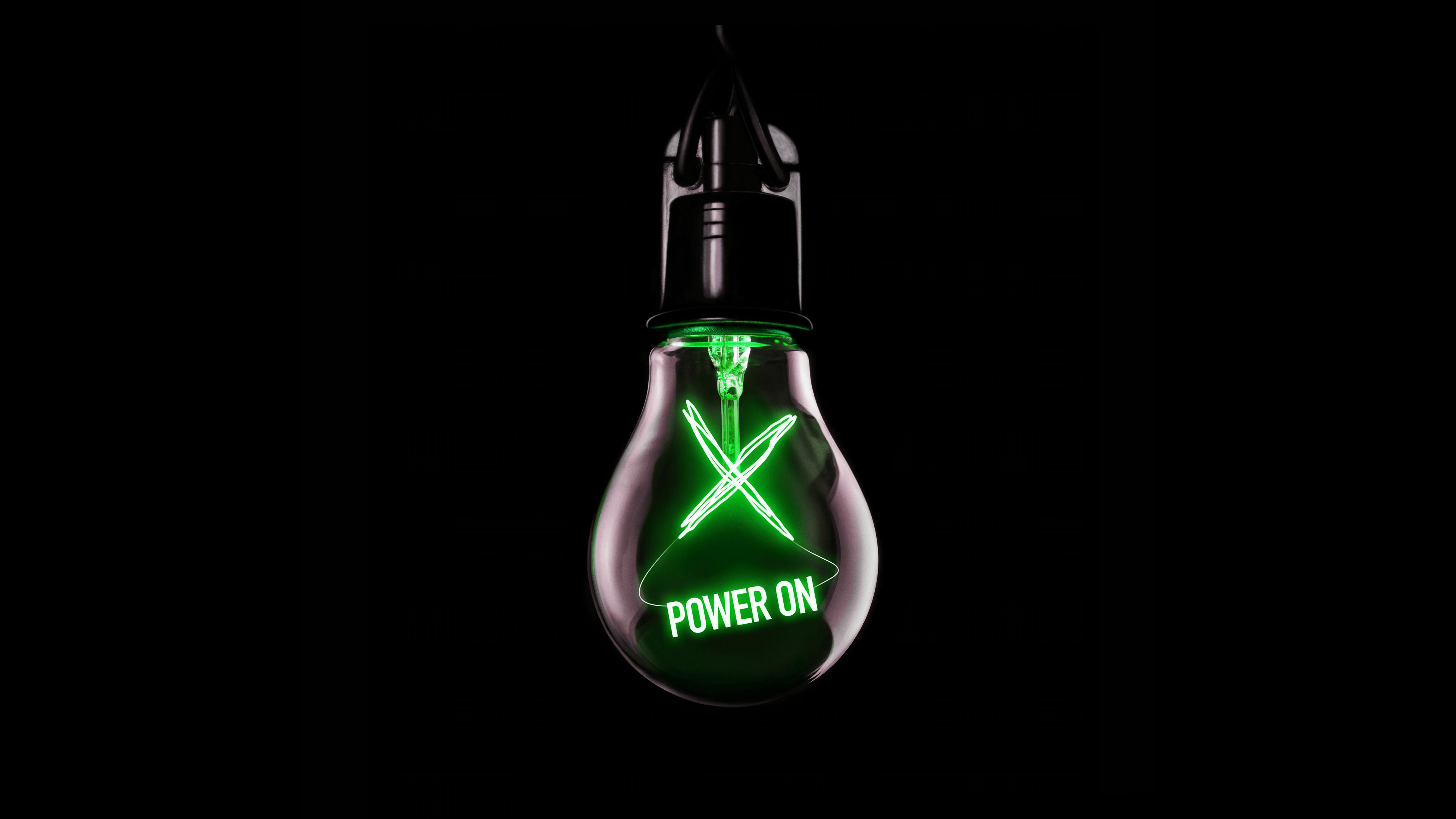 A glowing neon green Xbox logo set against a solid black background.