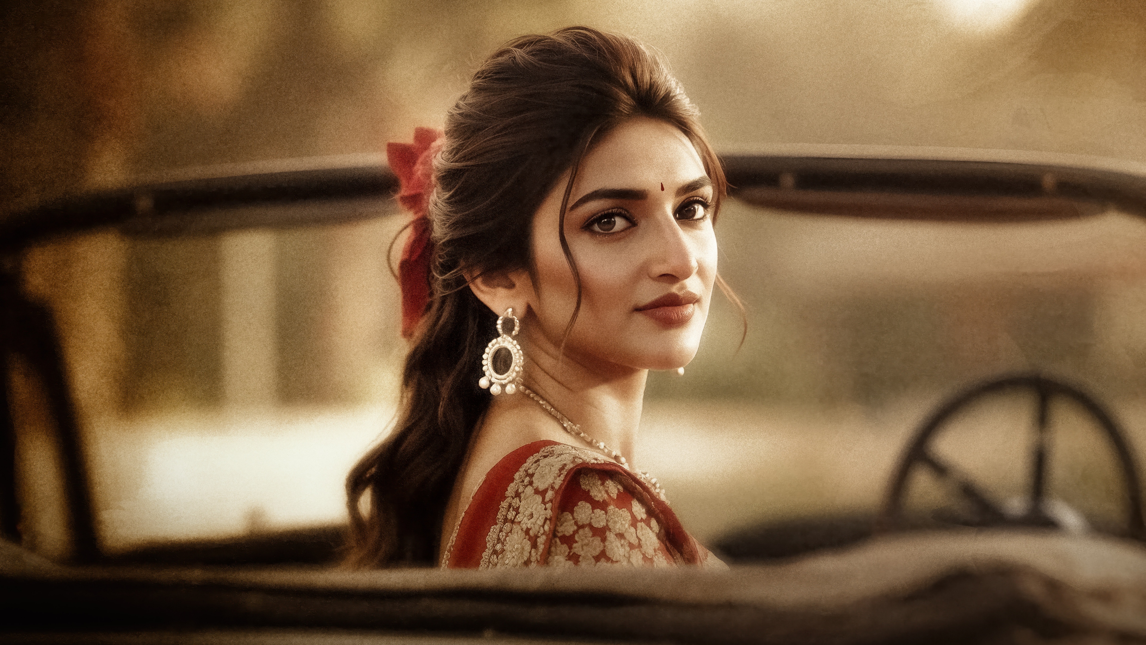 A vintage-style portrait of Indian actress Sreeleela wearing an elegant traditional saree.