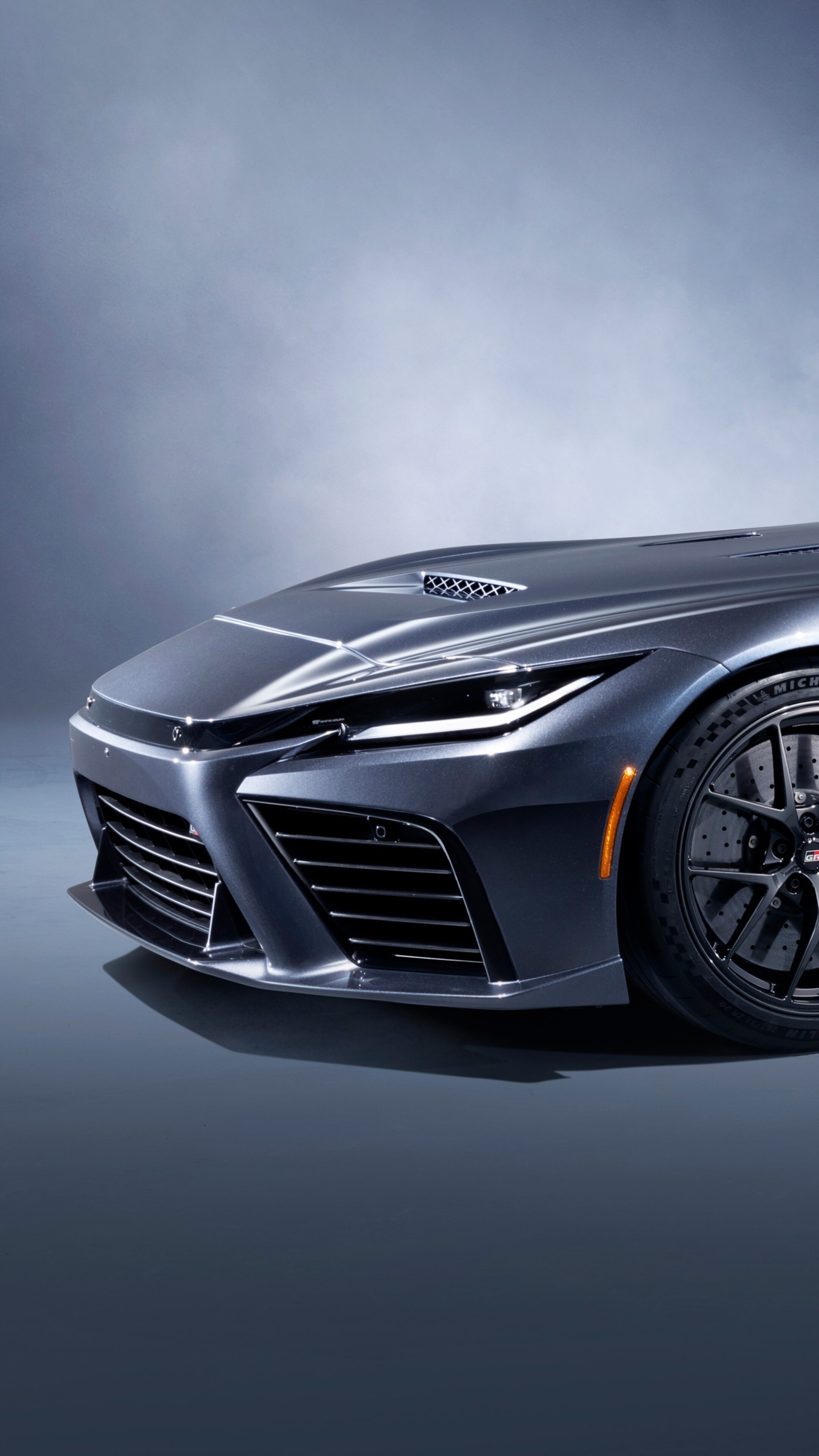 A detailed view of the sleek and aerodynamic 2025 Toyota GR GT Prototype concept car.