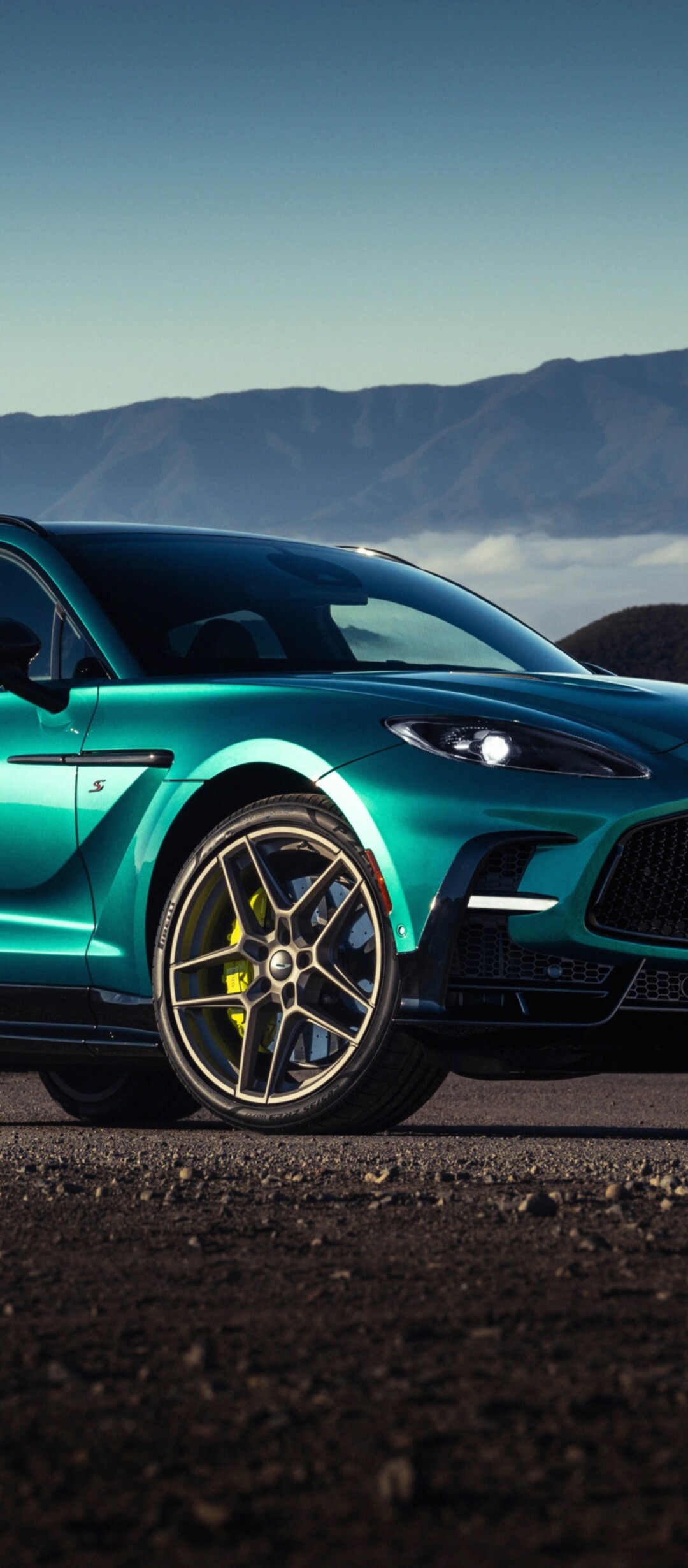 A highly detailed, cinematic view of the 2026 Aston Martin DBX S luxury SUV.