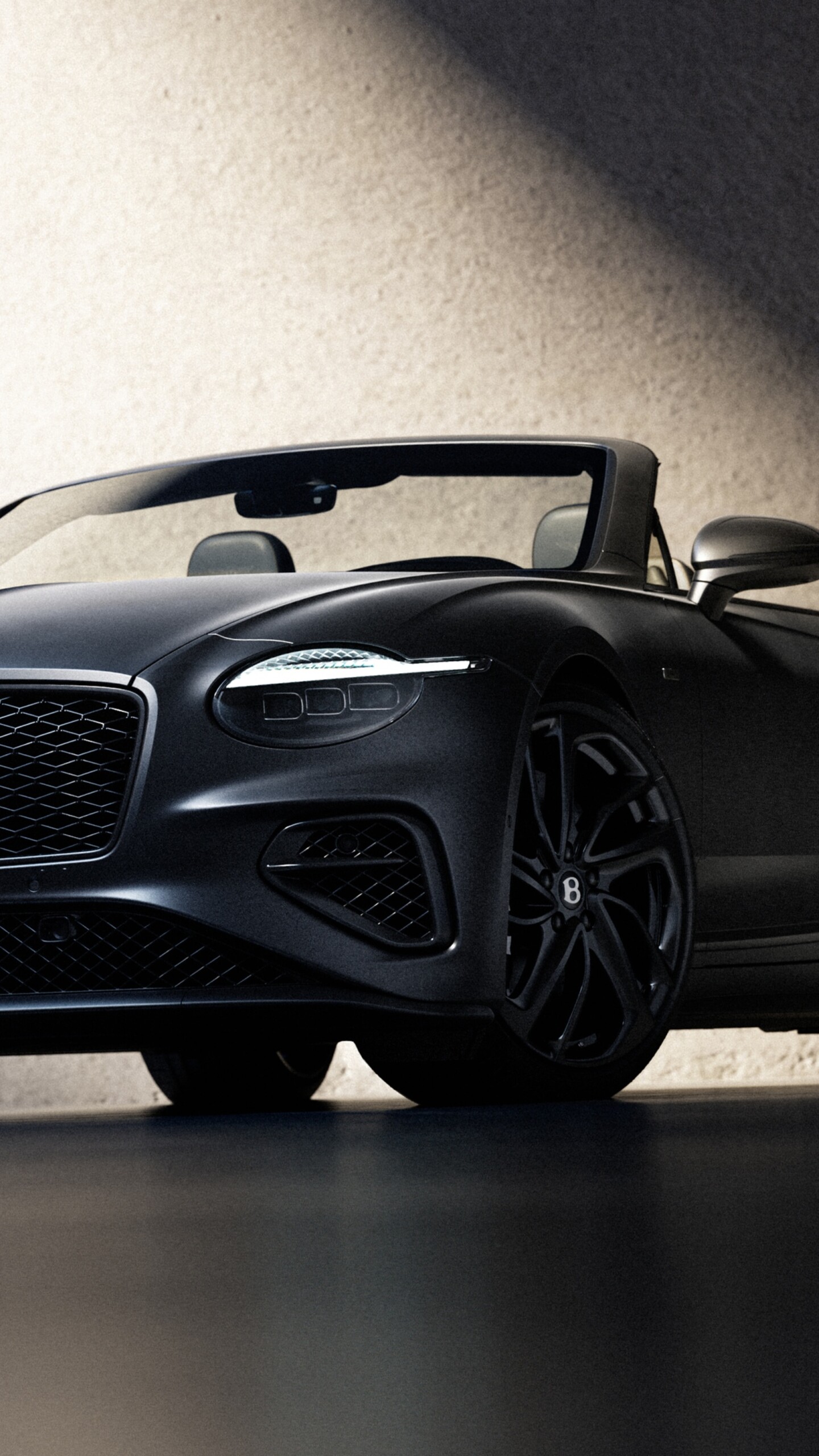 A detailed, high-quality view of the 2026 Bentley Continental GT Speed Convertible in a luxurious setting.