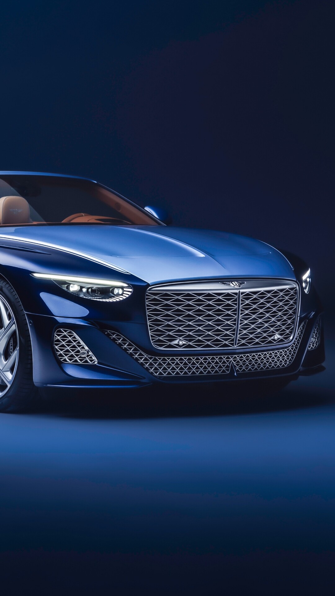 A luxurious 2026 Bentley Mulliner Batur Convertible featuring a monochromatic blue aesthetic and sleek design.