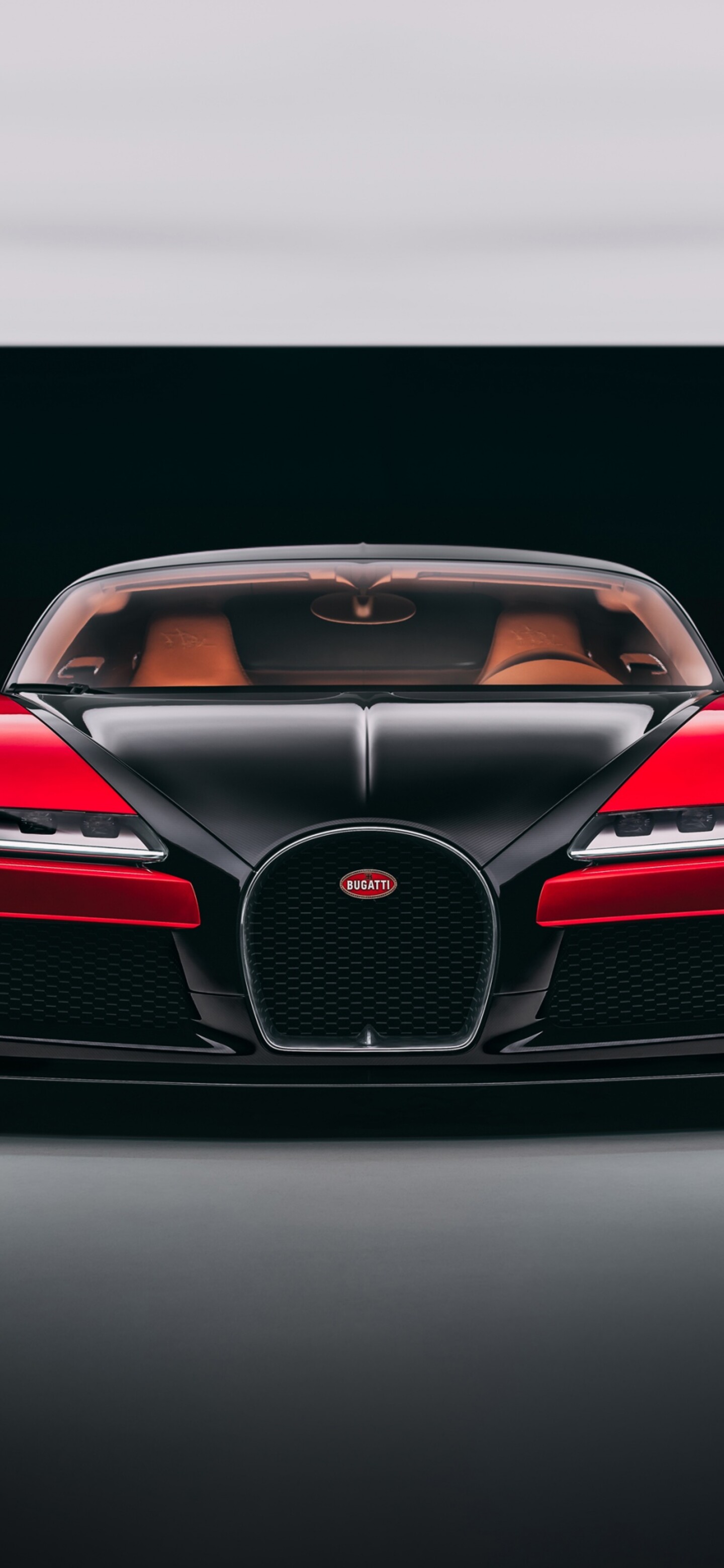 A sleek and futuristic 2026 Bugatti Veyron hypercar concept set against a dark, dramatic background.